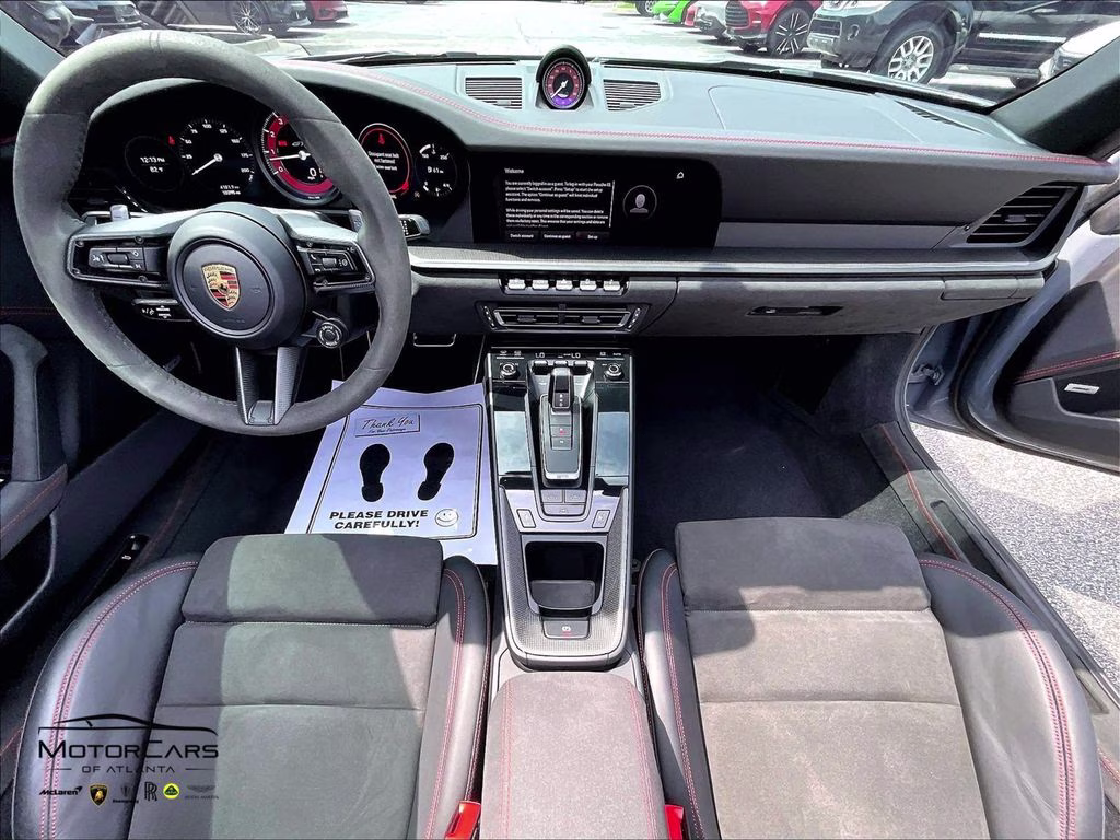 mph012_1690681845_wp0cb2a9xps248240_2023_porsche_911_carrera_gts_cabriolet_arctic_grey_13_112559_b436dda6c9