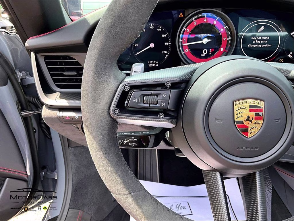 mph015_1098184993_wp0cb2a9xps248240_2023_porsche_911_carrera_gts_cabriolet_arctic_grey_16_112559_8d272a95b9