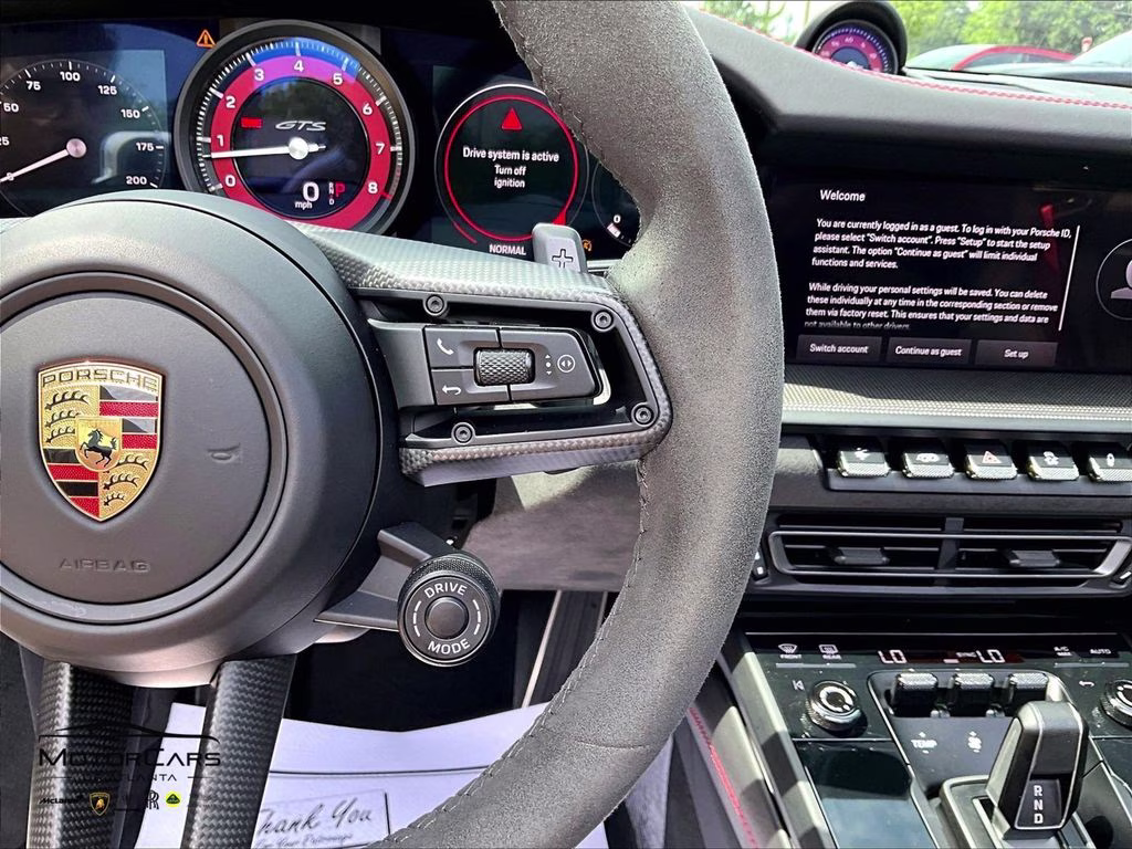 mph016_2616804489_wp0cb2a9xps248240_2023_porsche_911_carrera_gts_cabriolet_arctic_grey_17_112559_8fa09aab42