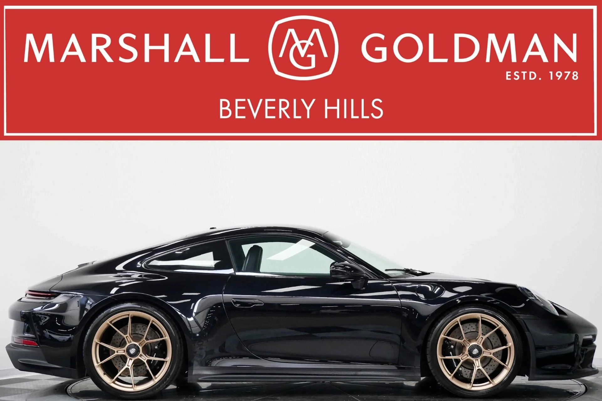 mph000_2066410711_Used_2022_Porsche_911_GT_3_Touring_6_Speed_Manual_Front_Axle_Lift_18_Way_Seats_1778004277_5b9ace141b