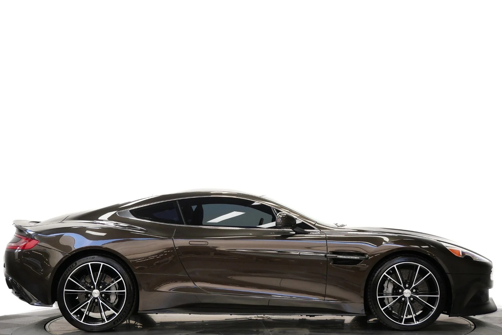 mph001_2621702696_Used_2014_Aston_Martin_Vanquish_Hourglass_Quilting_Beautiful_Color_V12_Power_1770409354_1aa40b13a6
