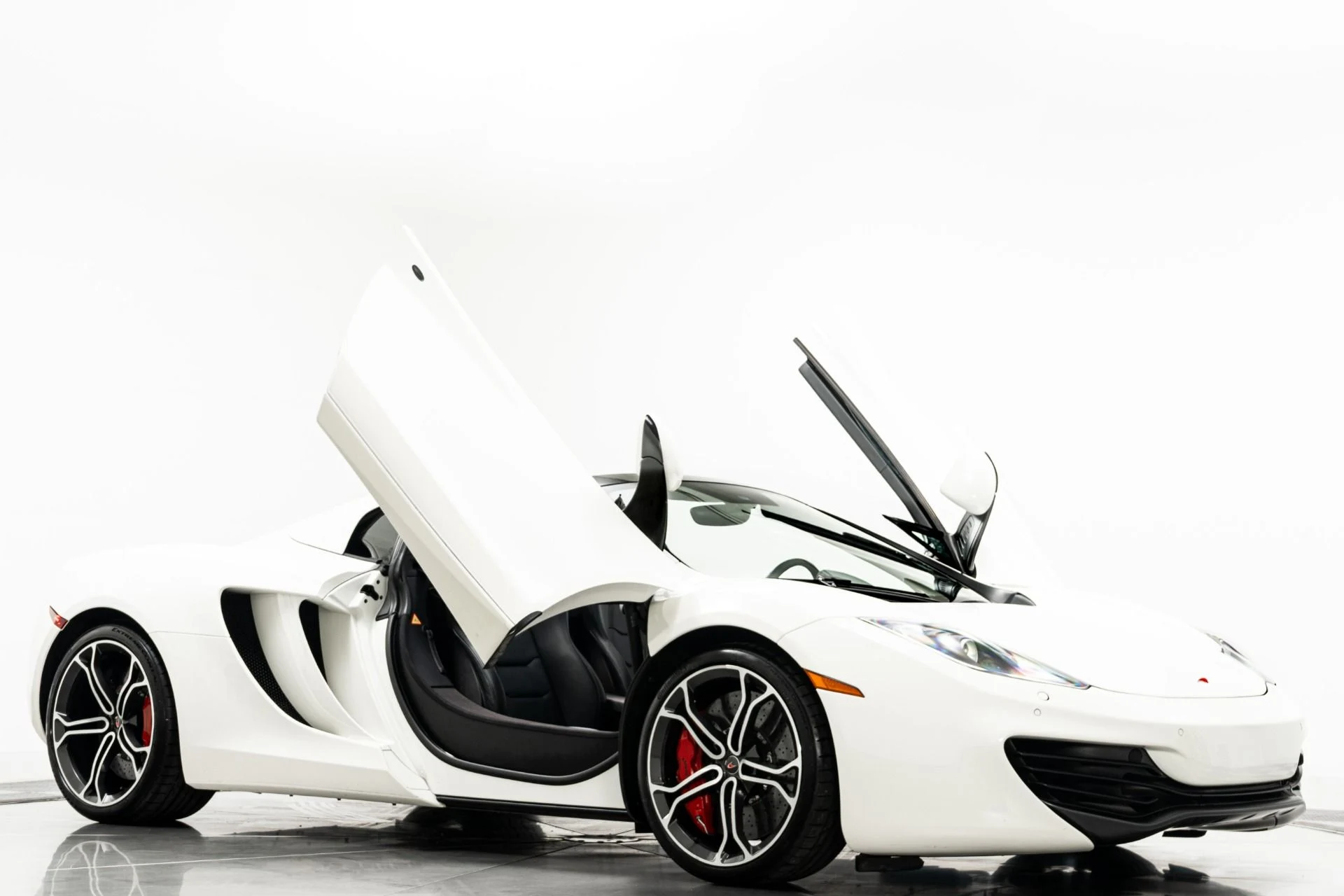 mph002_1607060332_Used_2014_Mc_Laren_MP_4_12_C_Spider_Retractable_Hardtop_616_Horsepower_Low_Miles_1779912294_989eb31224