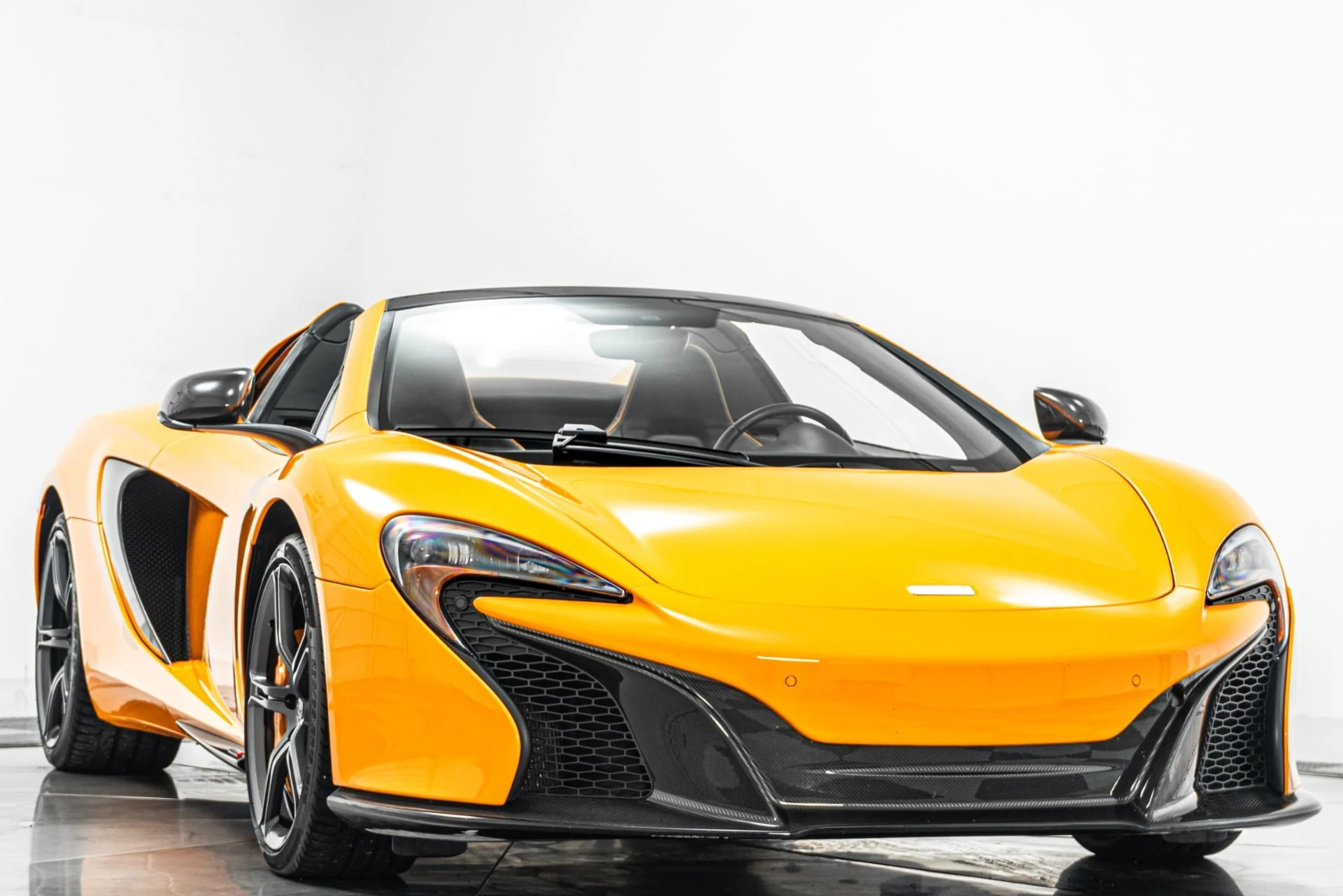 mph002_414905291_Used_2015_Mc_Laren_650_S_Spider_Interior_and_Exterior_Carbon_Packs_Suspension_Lifter_1778269559_1aca5fd41a