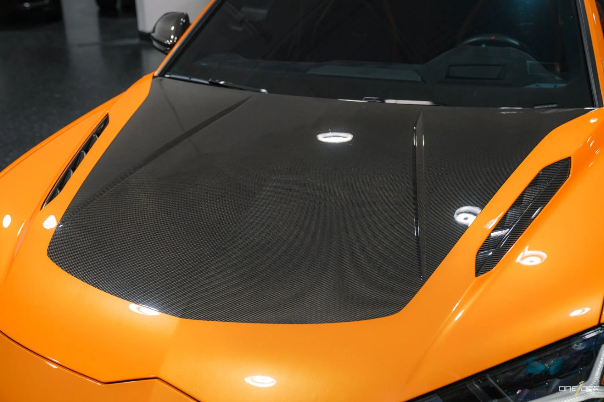 mph004_3371704139_Used_2023_Lamborghini_Urus_Performante_in_Arancio_Borealis_350_K_MSRP_Exposed_Carbon_Hood_1754940497_2e53f30e06