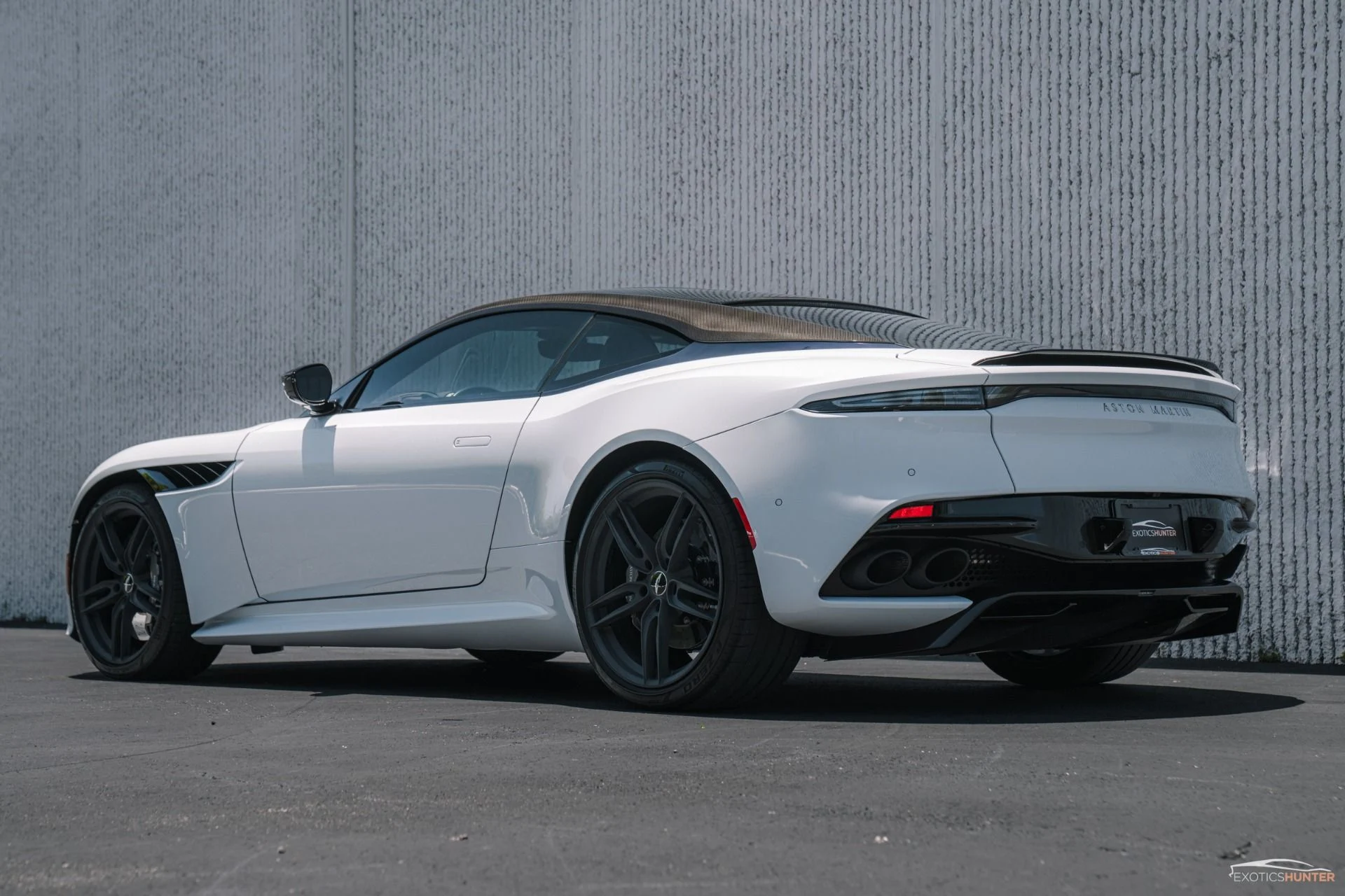 mph004_3727361104_Used_2019_Aston_Martin_DBS_Superleggera_in_White_Stone_w_Carbon_Exterior_1755546225_e4bf43caa6