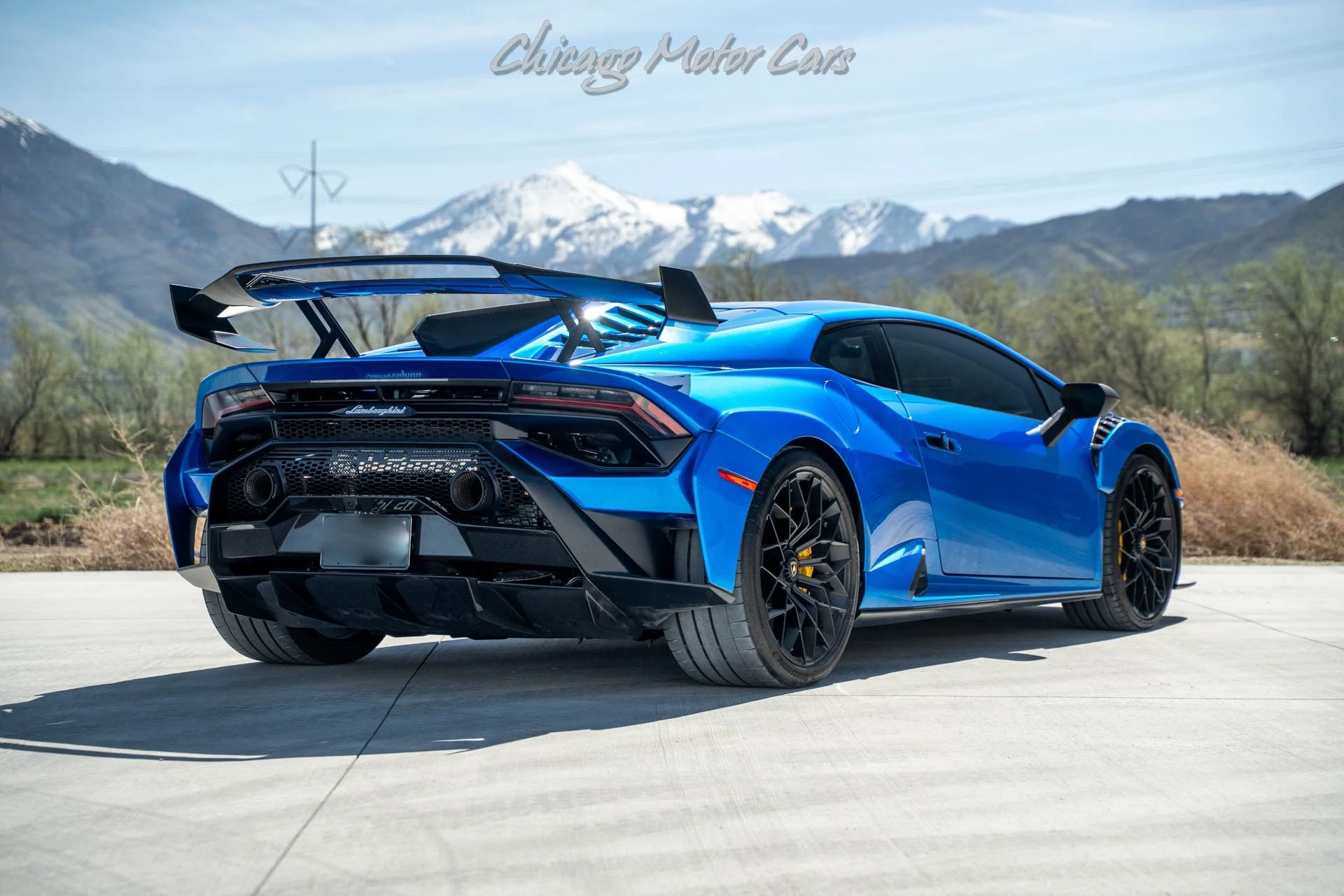 mph005_1189472718_Used_2023_Lamborghini_Huracan_STO_Original_MSRP_430k_Full_Exterior_Carbon_Pack_Blu_Nethuns_Full_PPF_1746050296_b28ec1f3a1