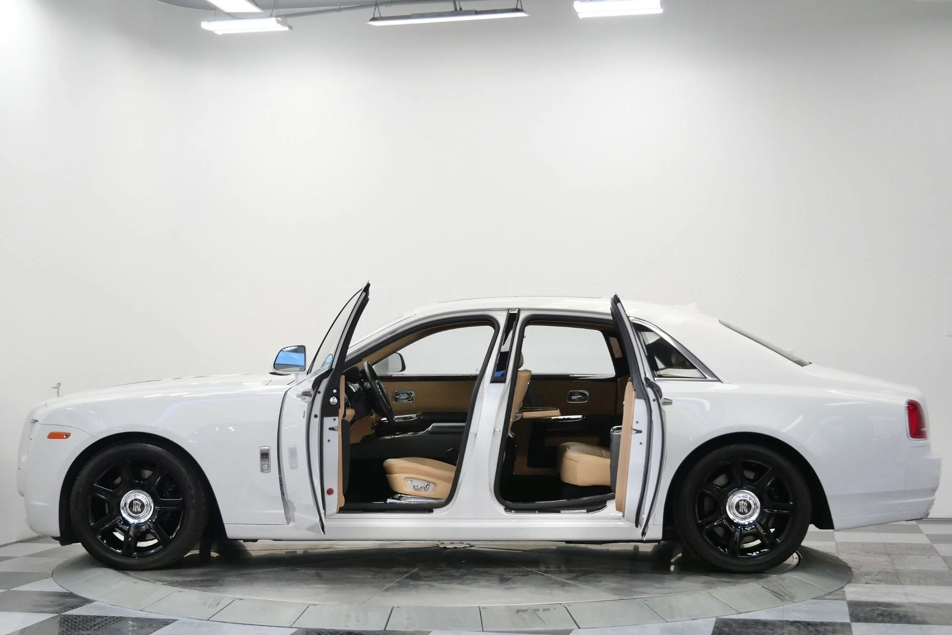 mph005_2087077324_Used_2013_Rolls_Royce_Ghost_Rear_Theatre_Configuration_Sunroof_Picnic_Tables_1765817779_72fb4dc17c