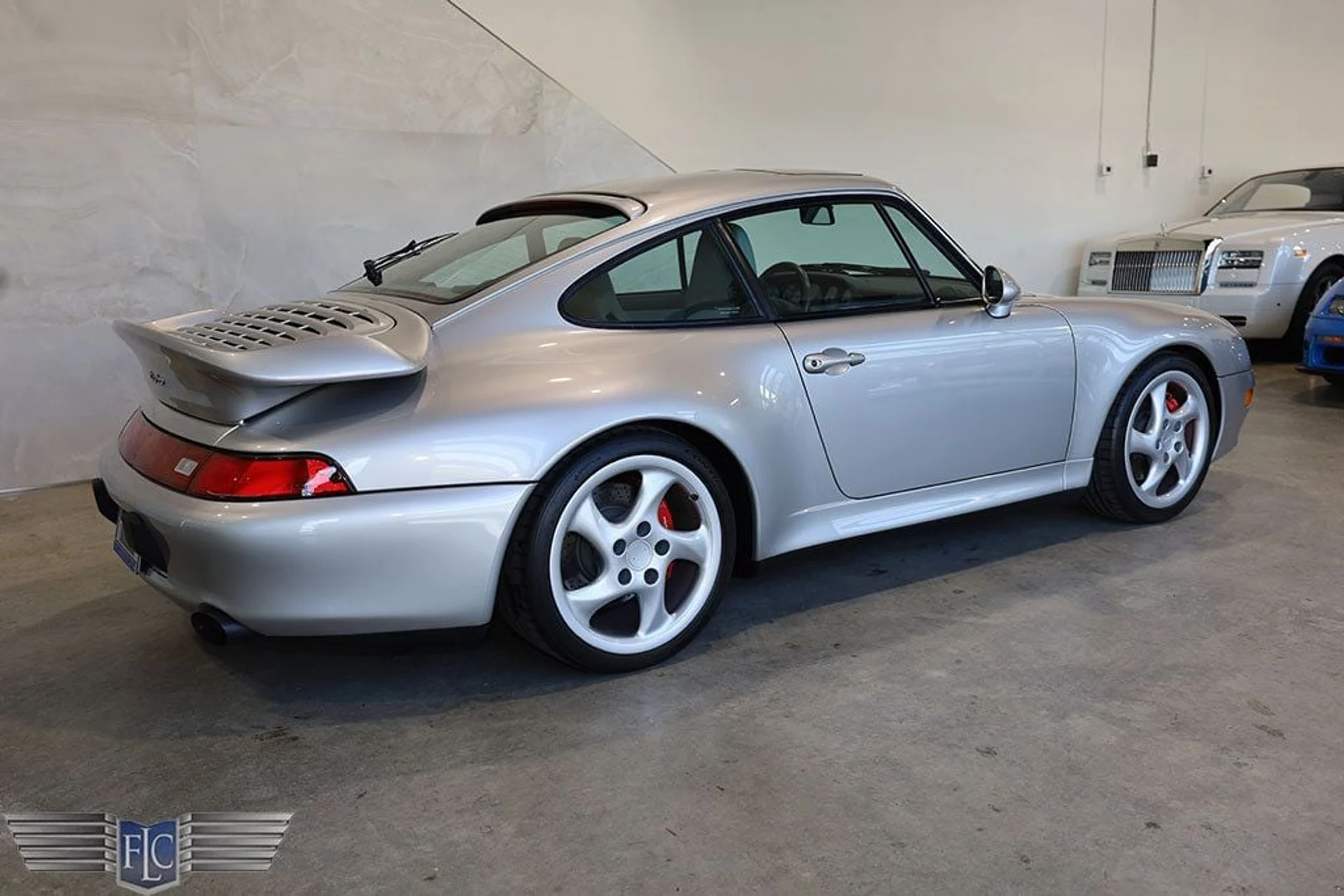 mph005_2294483906_used_1997_porsche_911_carrera_2drcarreraturbocoupe_9689_22597412_6_1024_ade6d748d3