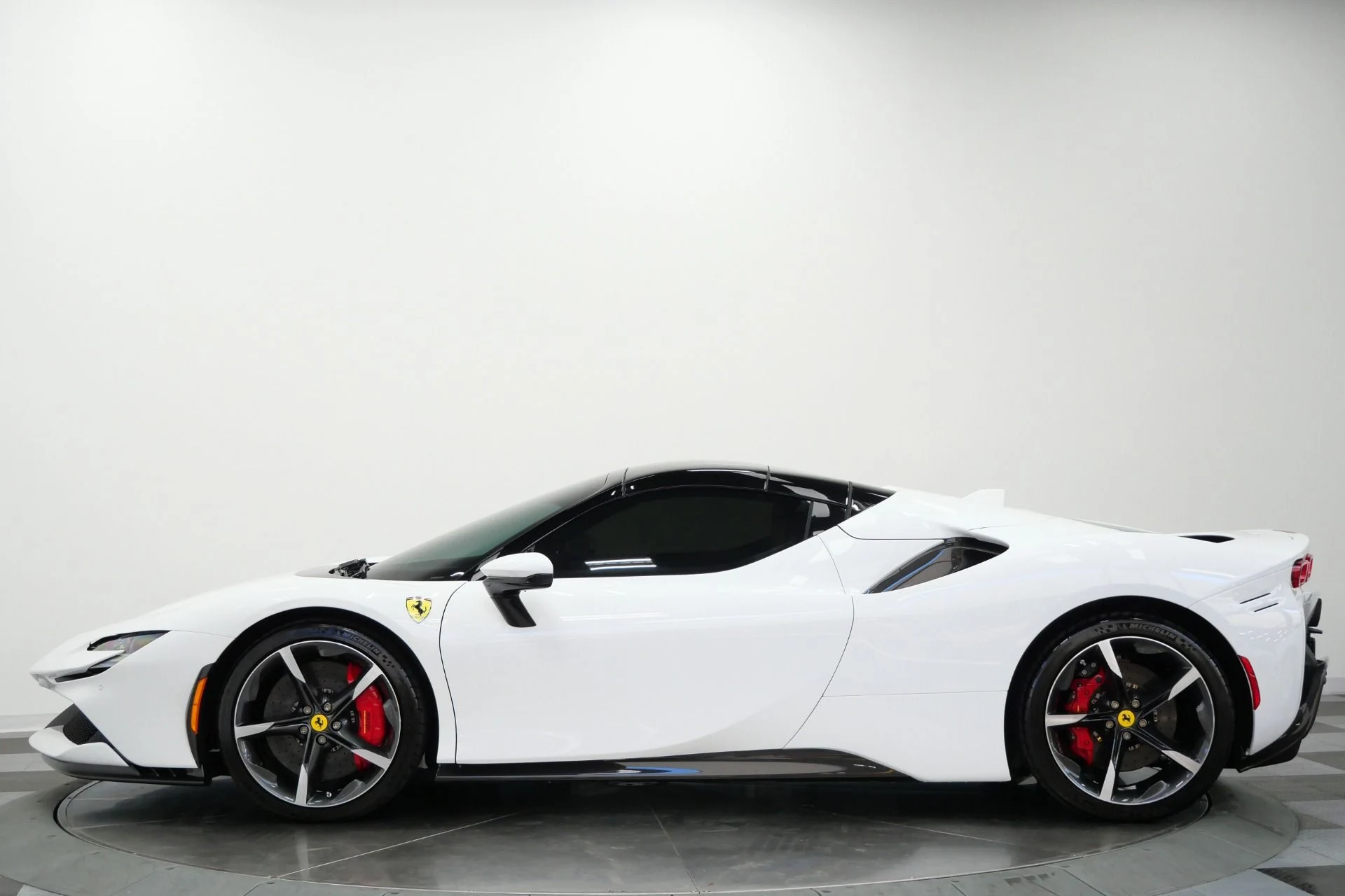 mph005_2595802507_Used_2025_Ferrari_SF_90_Spider_718_K_MSRP_Two_Tone_Exterior_Two_Tone_Interior_Extensive_Carbon_1788280575_6a5b50c557