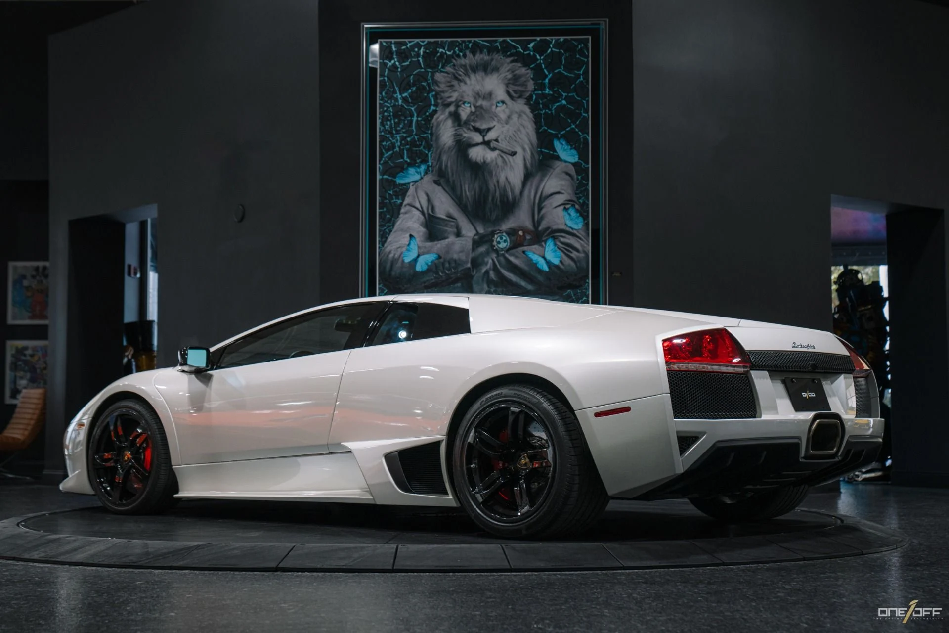 mph005_3978255844_Used_2009_Lamborghini_Murcielago_LP_640_in_Balloon_White_over_Red_Interior_w_Front_Lift_1754600274_2a5e1421c4