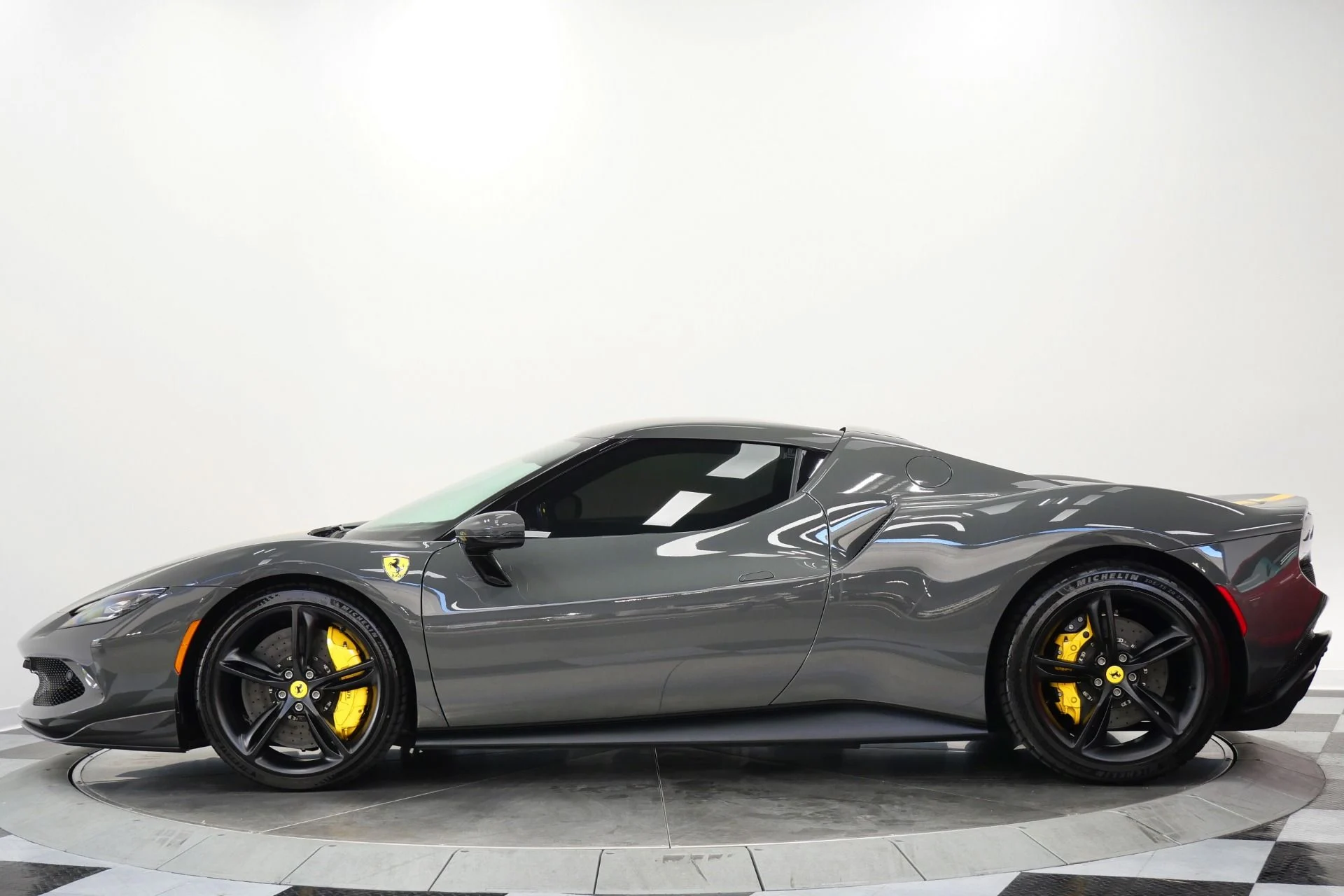 mph005_624697137_Used_2023_Ferrari_296_GTB_Livery_stripes_Carbon_Fiber_Racing_Seats_Yellow_Stitching_1769812467_e6f807c3ae