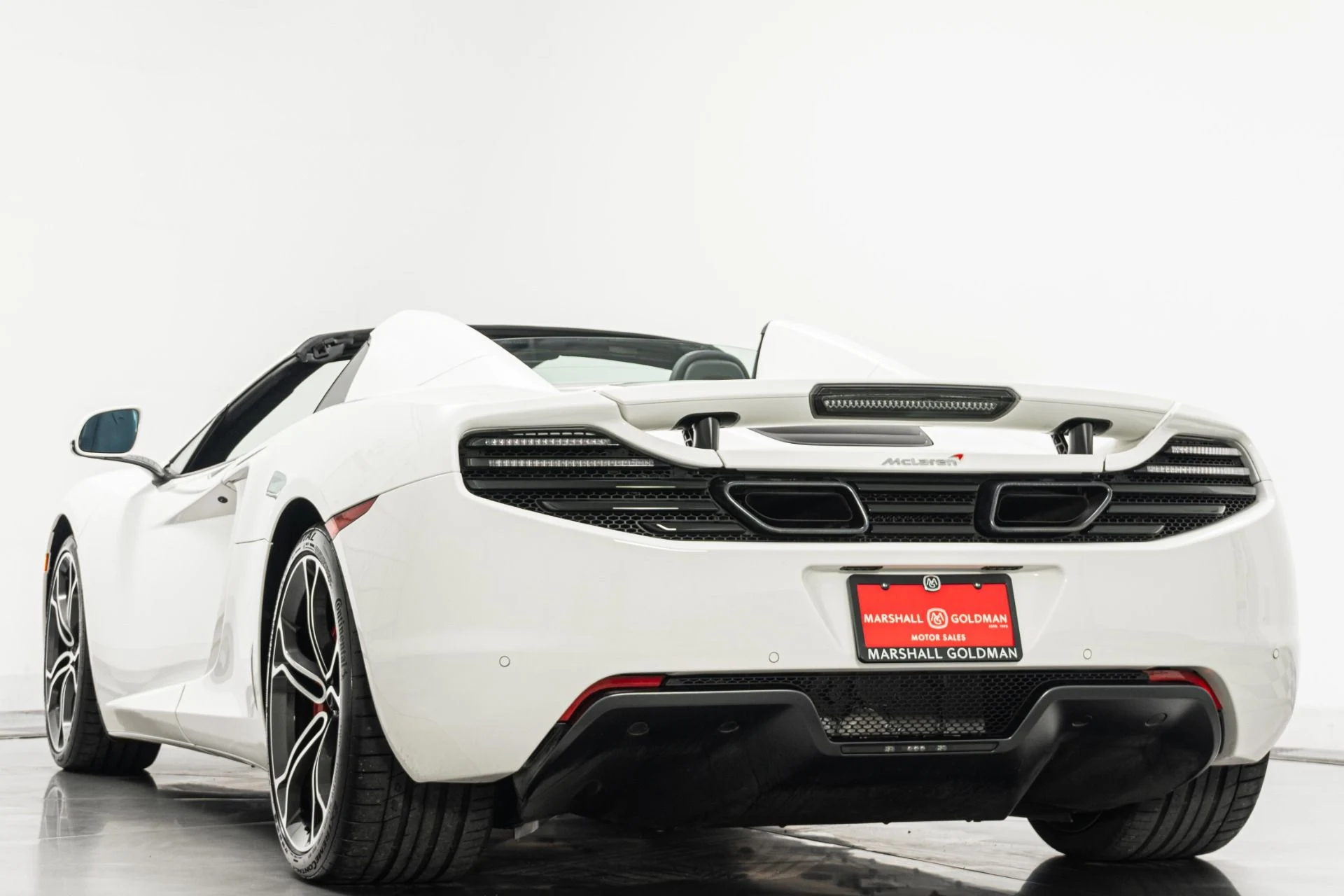 mph006_1310606171_Used_2014_Mc_Laren_MP_4_12_C_Spider_Retractable_Hardtop_616_Horsepower_Low_Miles_1779912312_194daaab7c