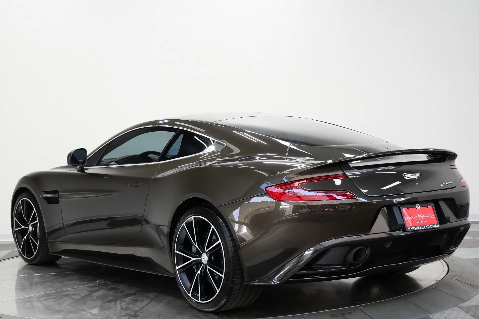 mph006_328353738_Used_2014_Aston_Martin_Vanquish_Hourglass_Quilting_Beautiful_Color_V12_Power_1770409354_e19faea653