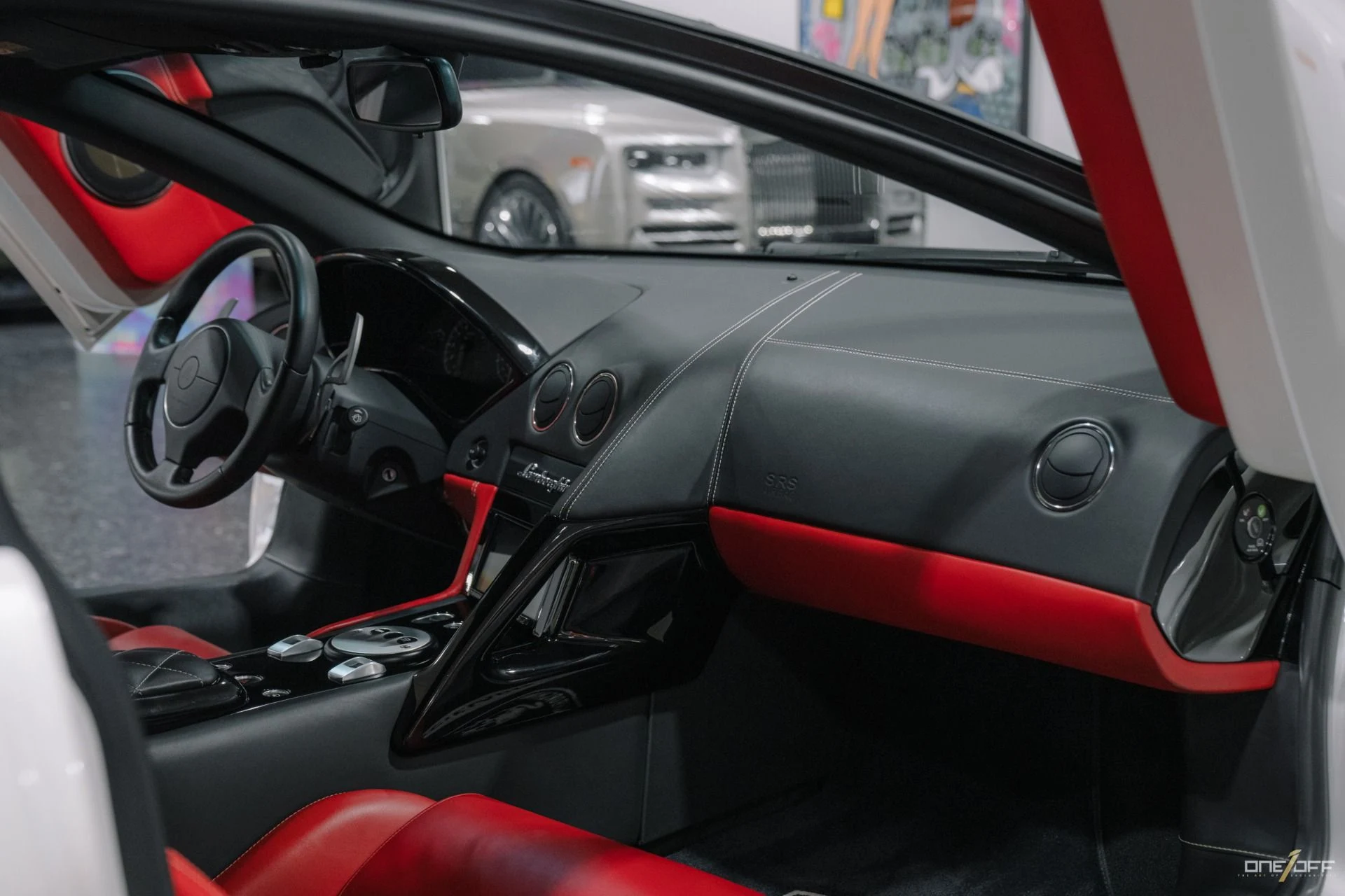 mph006_678171323_Used_2009_Lamborghini_Murcielago_LP_640_in_Balloon_White_over_Red_Interior_w_Front_Lift_1754600274_27a3ad0dfc