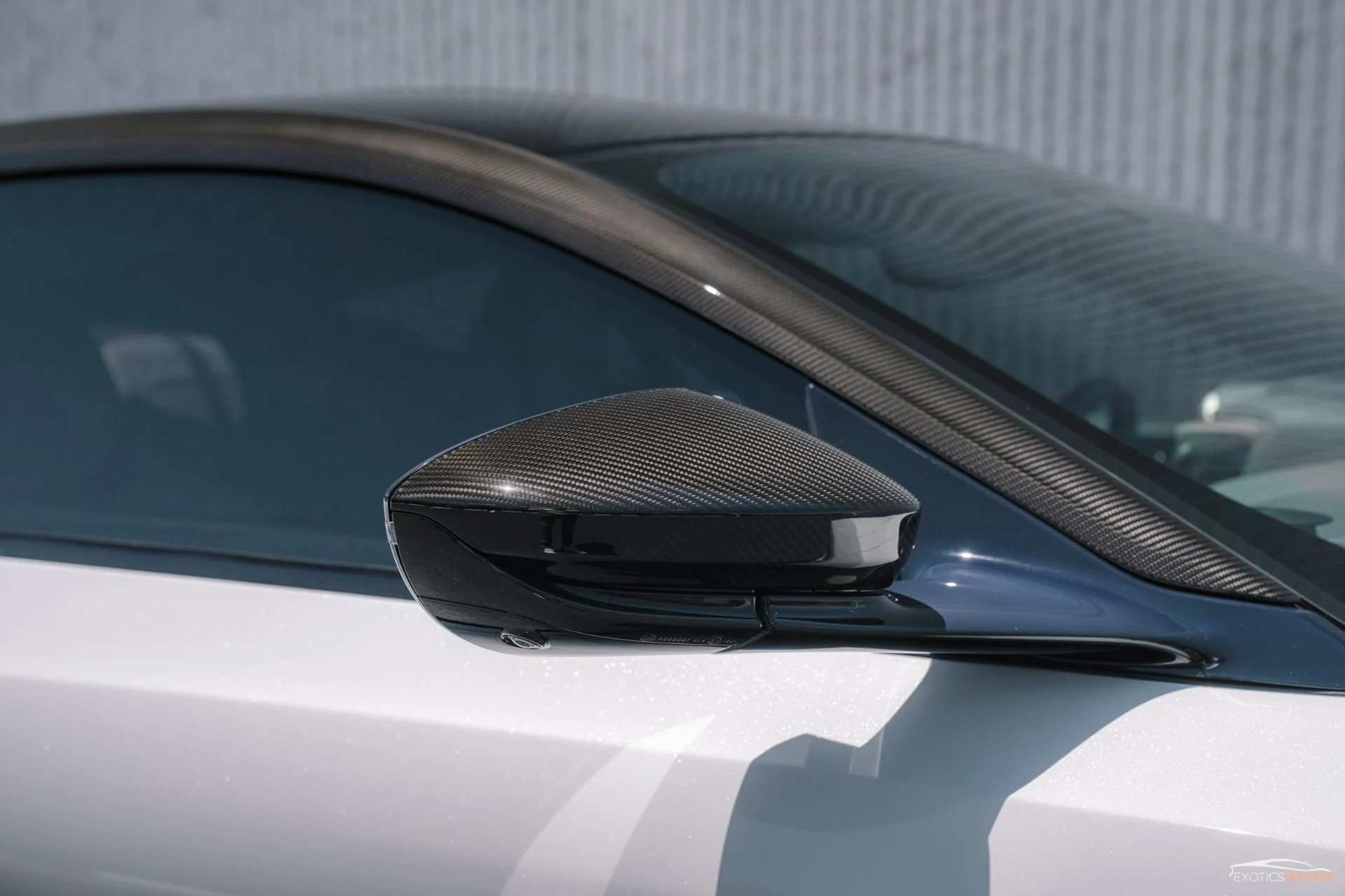 mph007_2575478567_Used_2019_Aston_Martin_DBS_Superleggera_in_White_Stone_w_Carbon_Exterior_1755546225_0ec43d035e