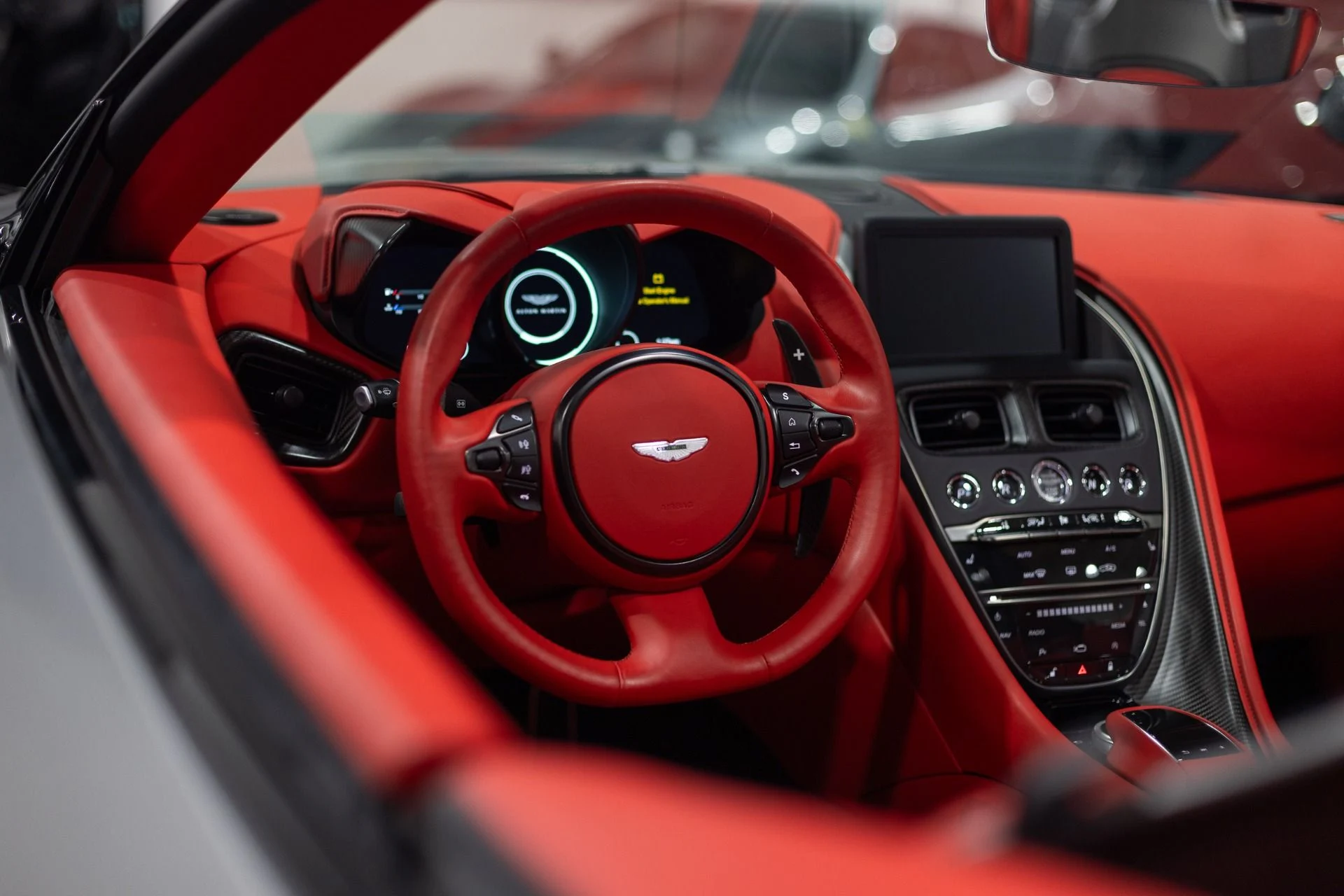 mph007_2595687576_Used_2023_Aston_Martin_DBS_770_Ultimate_Satin_Aluminite_Silver_Paint_Spicy_Red_Interior_HRE_522_M_1773415069_2523f0ce9e