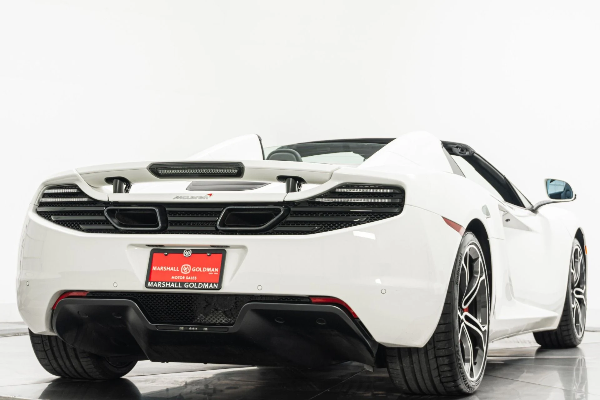 mph008_2747313642_Used_2014_Mc_Laren_MP_4_12_C_Spider_Retractable_Hardtop_616_Horsepower_Low_Miles_1779912312_2ca87713a3