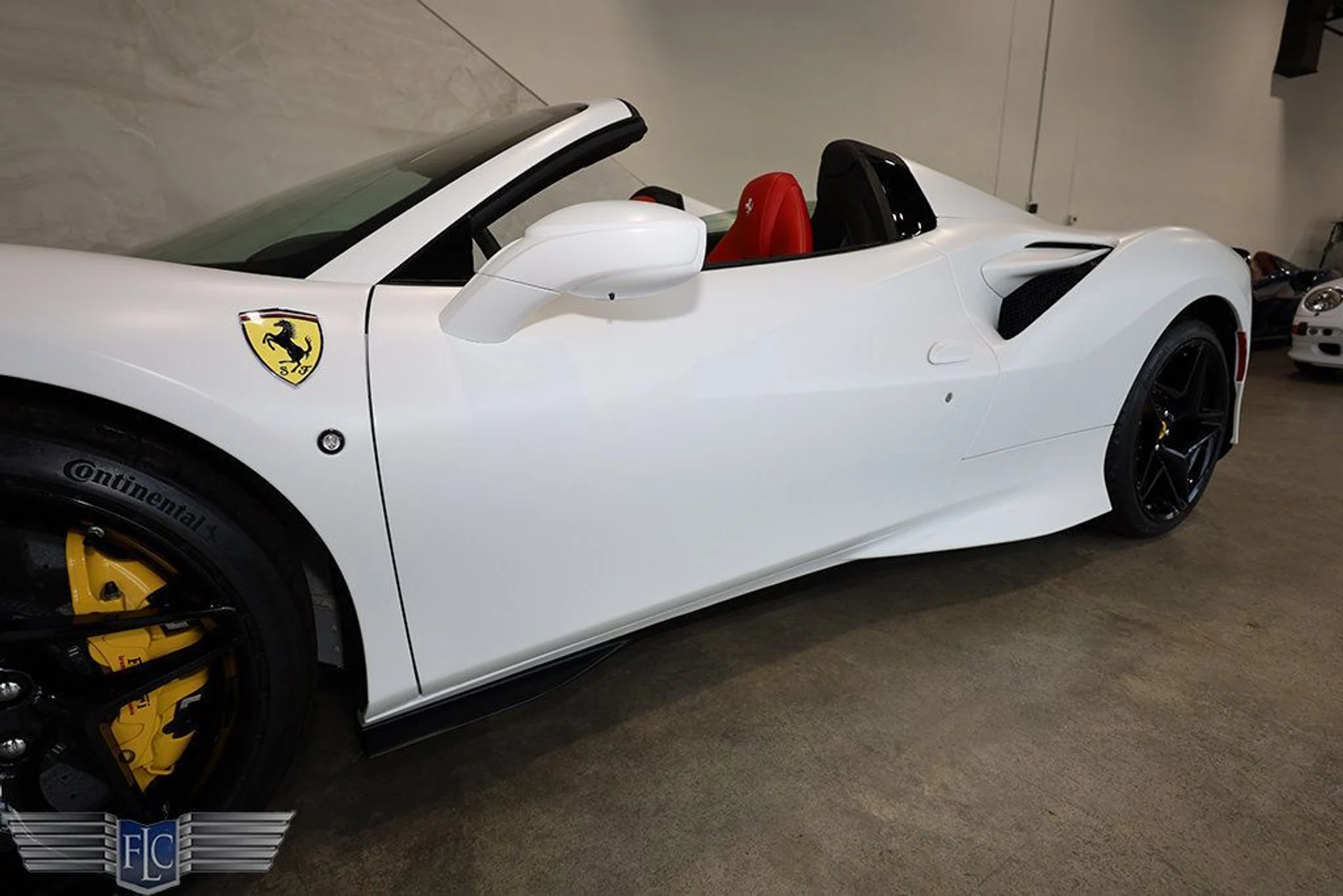 mph008_3757051538_used_2023_ferrari_f8_spider_convertible_9689_22910555_9_1024_dda34fc0a2
