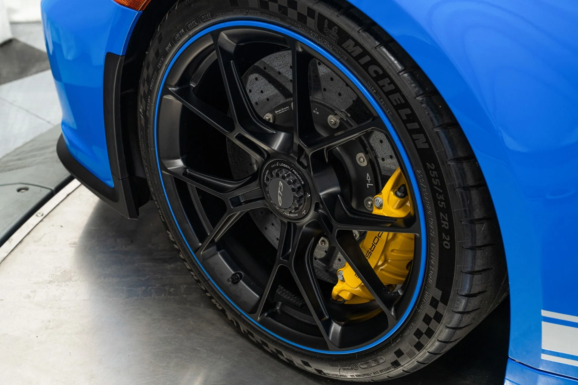 mph009_3092853517_Used_2022_Porsche_911_GT_3_6_Speed_Manual_Low_Miles_Carbon_Roof_Blue_Stitching_1762362597_99f4a6468f