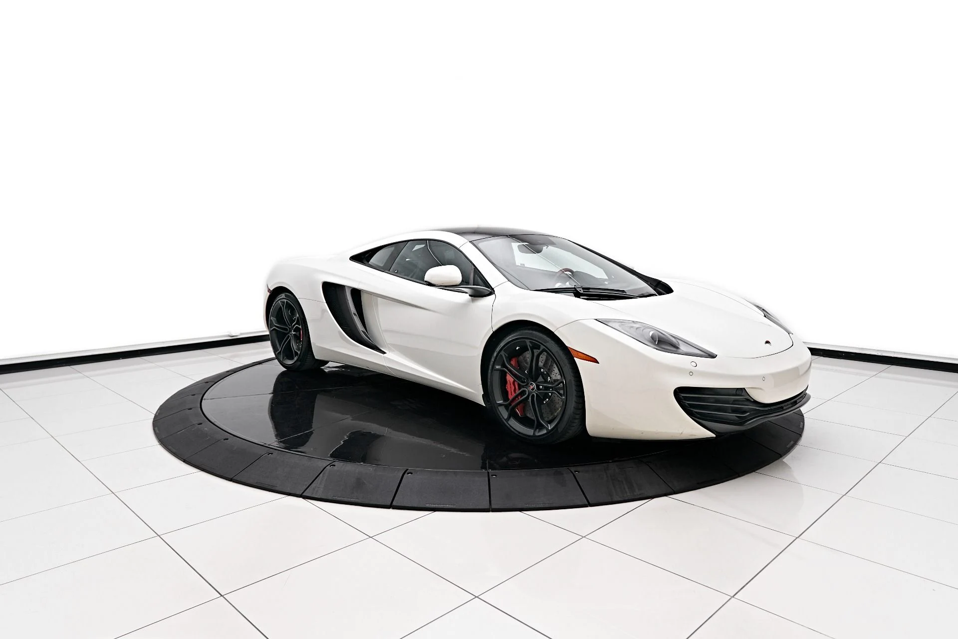 mph009_3094062051_Used_2012_Mc_Laren_MP_4_12_C_Base_1709431275_7fca33a29a