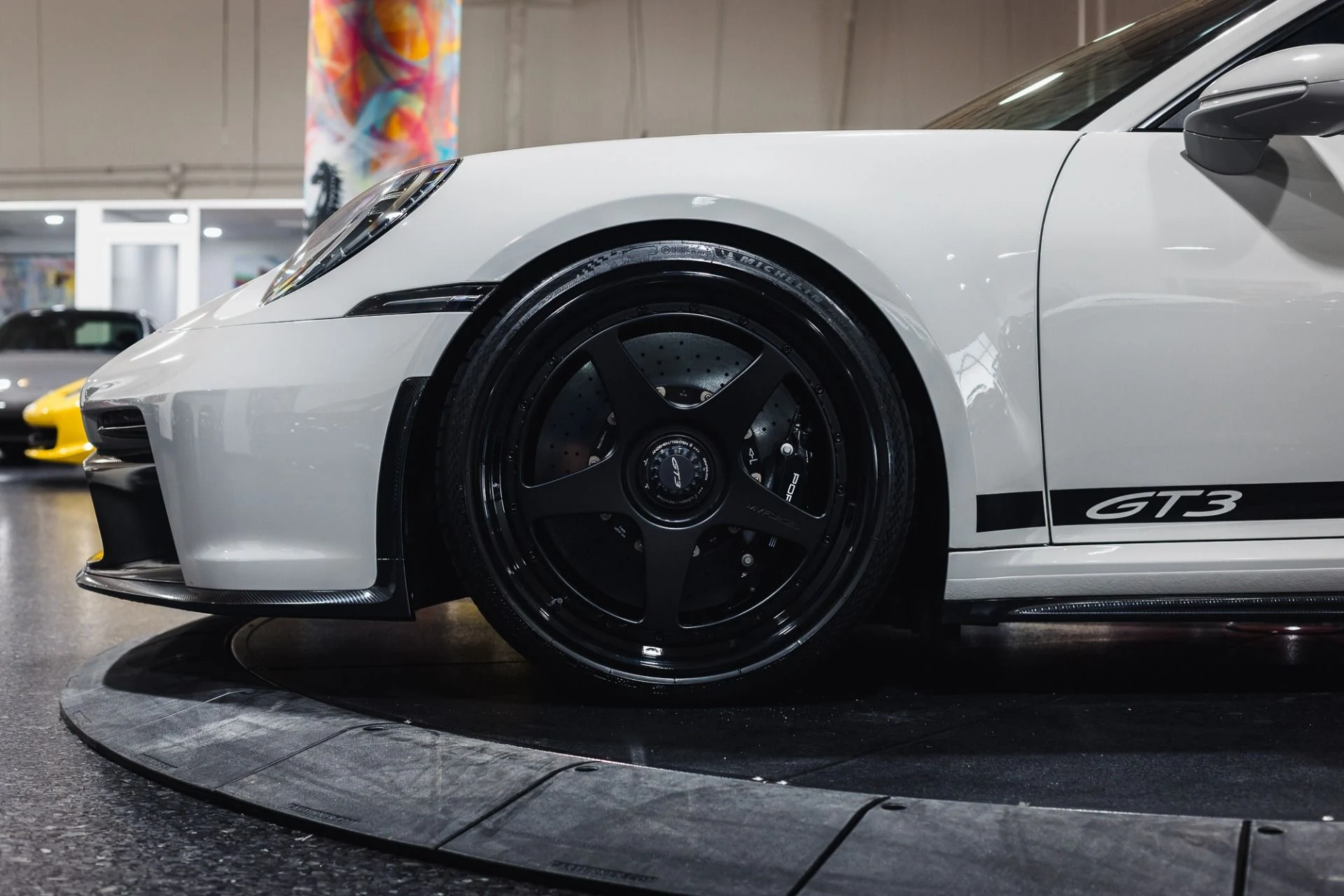 mph009_4193201219_Used_2022_Porsche_911_GT_3_Chalk_CC_Bs_Tasteful_Upgrades_1775764800_7afa5de583