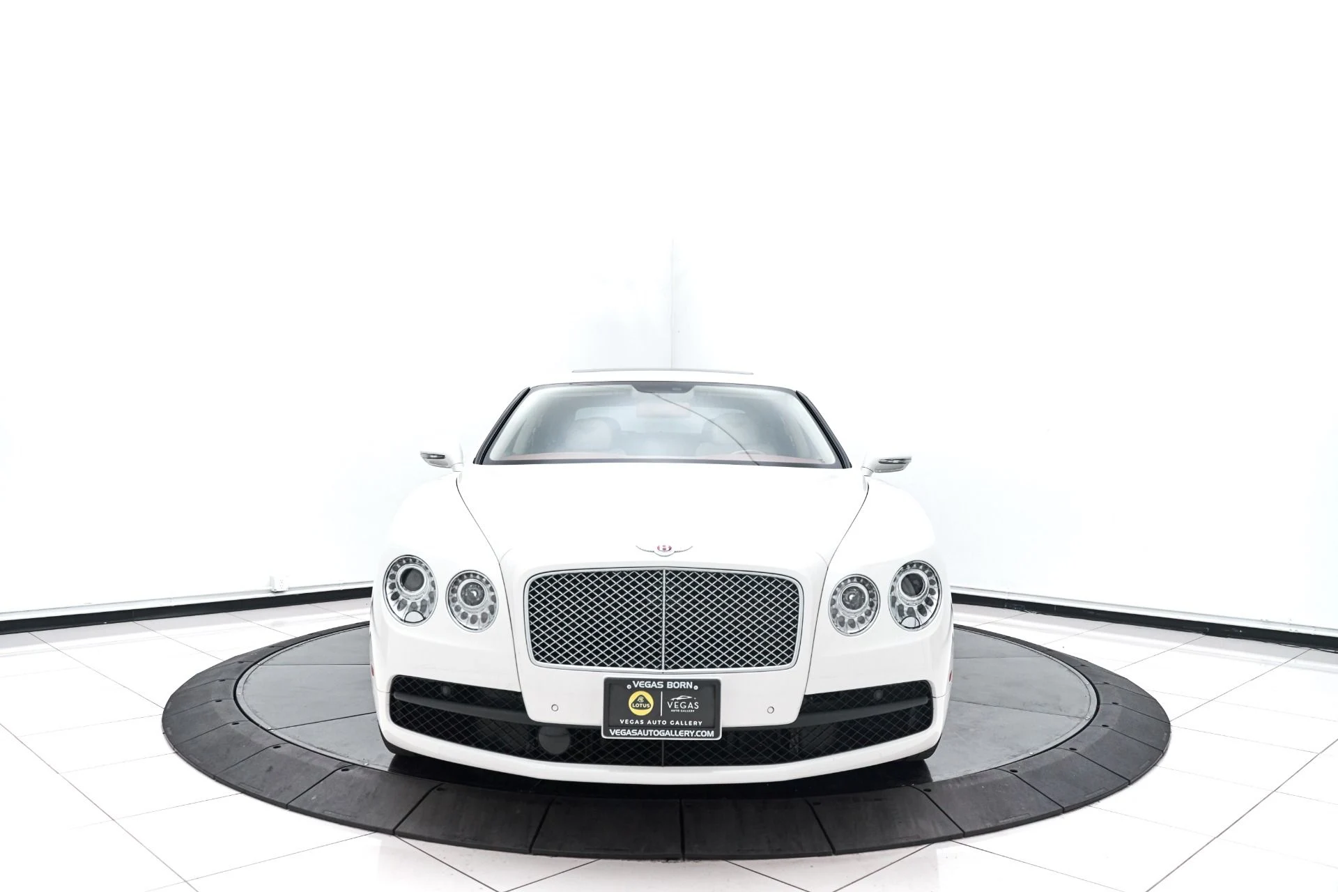 mph010_1944474449_Used_2015_Bentley_Flying_Spur_V8_1615575338_2f7ce5188a