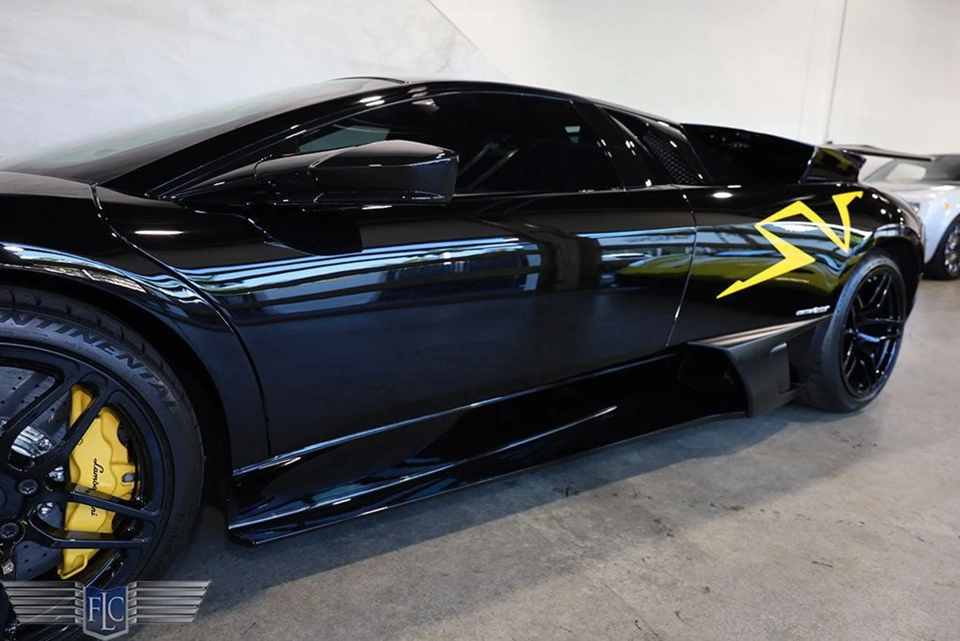 mph010_2792808873_used_2010_lamborghini_murcielago_2drlp6704superveloce_9689_22931171_11_1024_77e6bca383