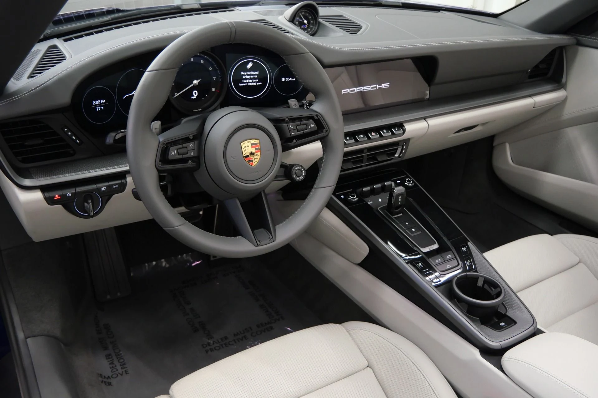 mph011_3217381658_Used_2023_Porsche_911_Carrera_Cabriolet_Premium_Package_Sport_Exhaust_Carrera_Classic_Wheels_1759422988_00c1773785