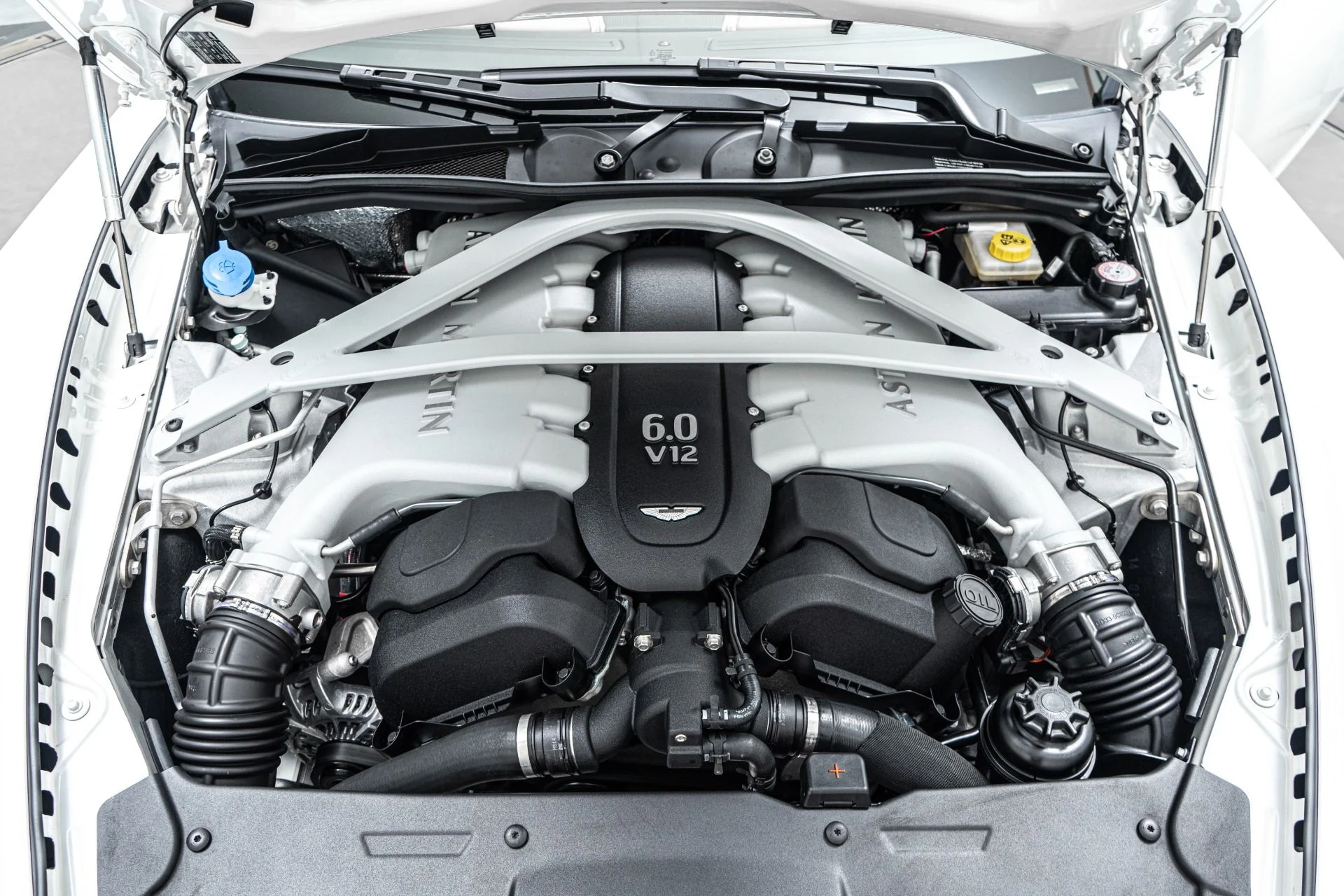 mph011_3336705864_Used_2014_Aston_Martin_DB_9_Volante_Very_Low_Miles_Pearlescent_Paint_V12_Power_1773670824_432bcbc3f2