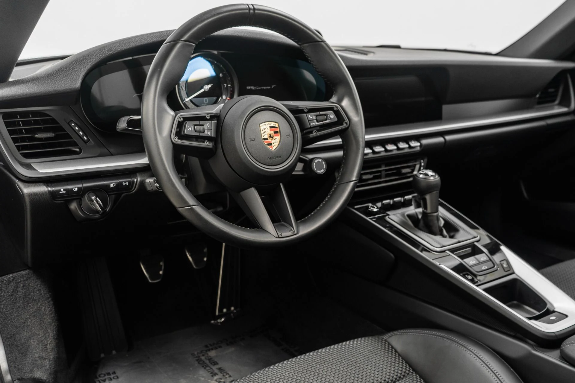 mph012_1838629986_Used_2023_Porsche_911_Carrera_T_7_Speed_Manual_Sport_Design_package_Carrera_Exclusive_Wheels_1777662329_07ef4324e7
