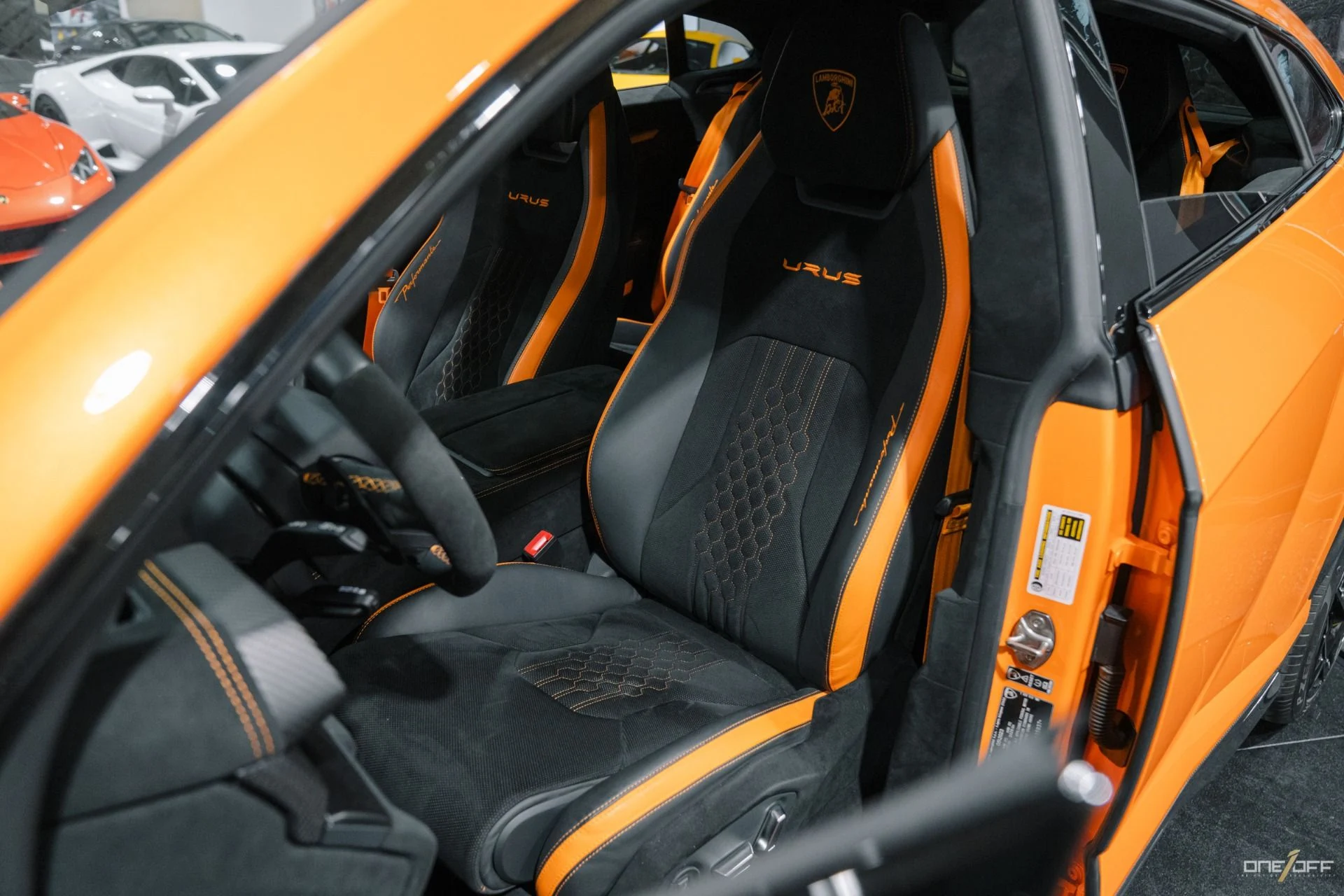 mph012_1977818064_Used_2023_Lamborghini_Urus_Performante_in_Arancio_Borealis_350_K_MSRP_Exposed_Carbon_Hood_1754940497_85e25a1209