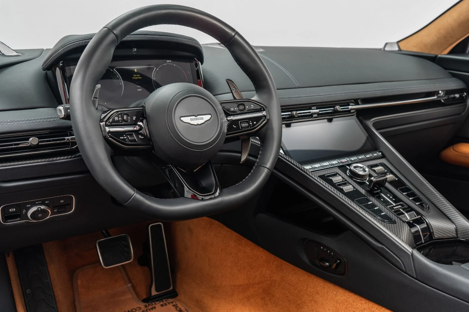 mph012_2483588784_Used_2024_Aston_Martin_DB_12_Volante_Carbon_Fiber_Bucket_Seats_Heritage_Paint_Color_1773867859_3bdc1beb1c