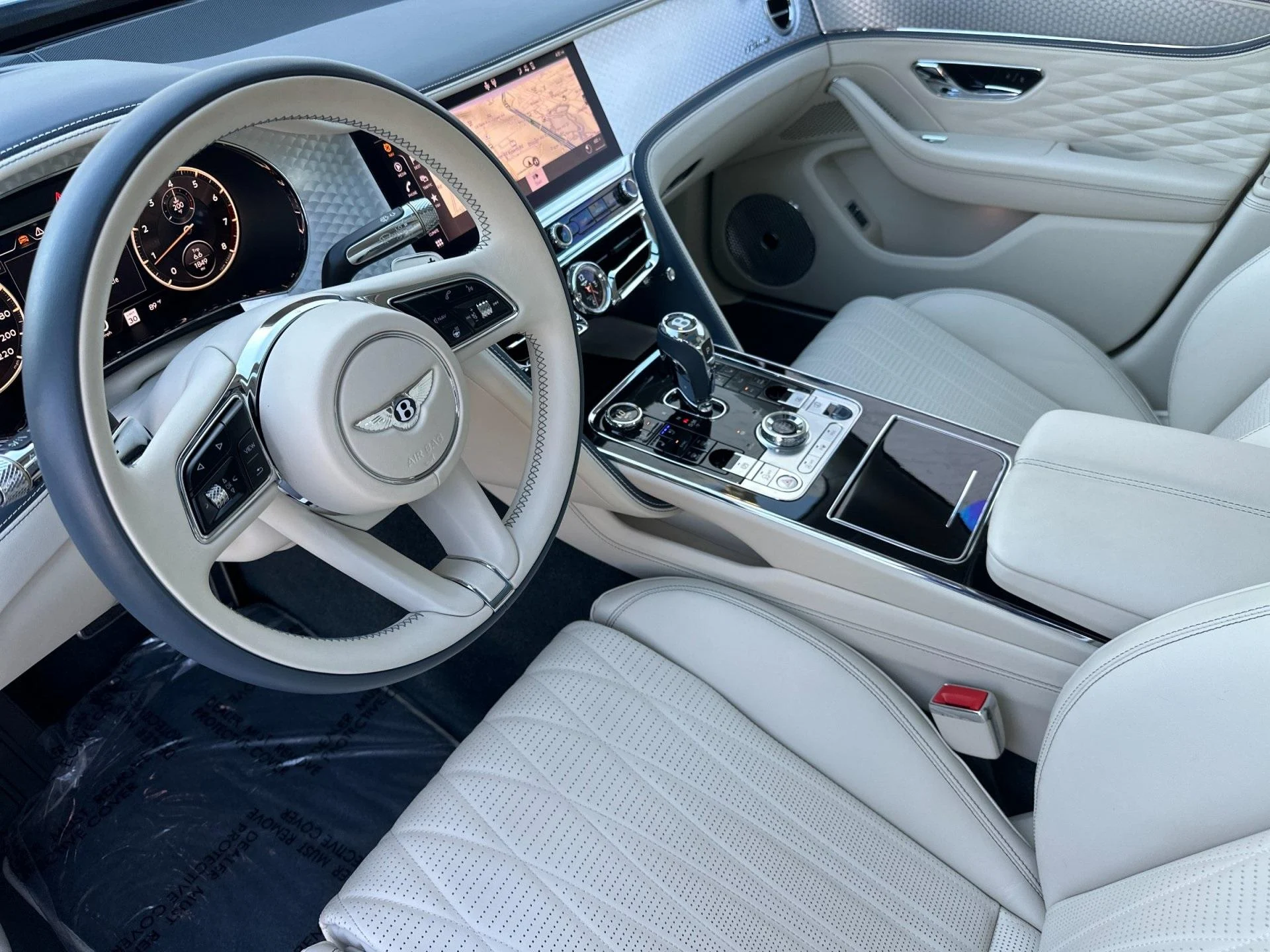 mph012_3150592472_Used_2024_Bentley_Flying_Spur_1760603844_63dc608c8a