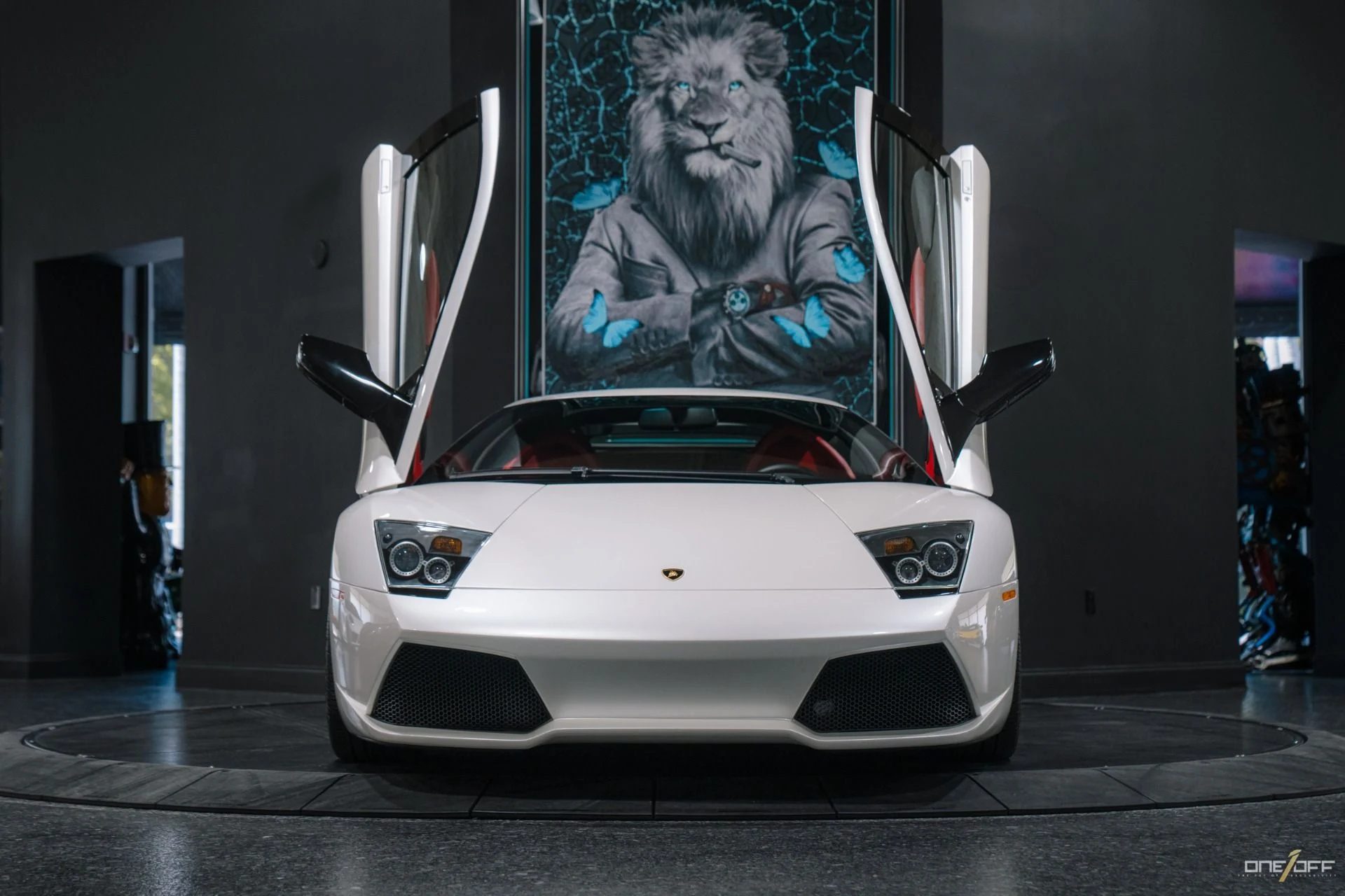 mph012_3749190445_Used_2009_Lamborghini_Murcielago_LP_640_in_Balloon_White_over_Red_Interior_w_Front_Lift_1754600274_e87af5dc08