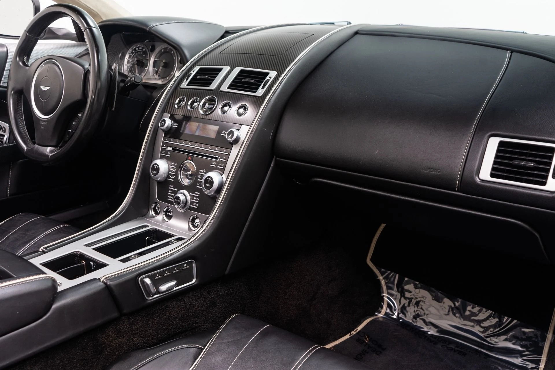 mph013_3043276329_Used_2014_Aston_Martin_DB_9_Volante_V12_20_Inch_Wheels_Carbon_Fiber_Trim_1756220918_7ca325e3c6