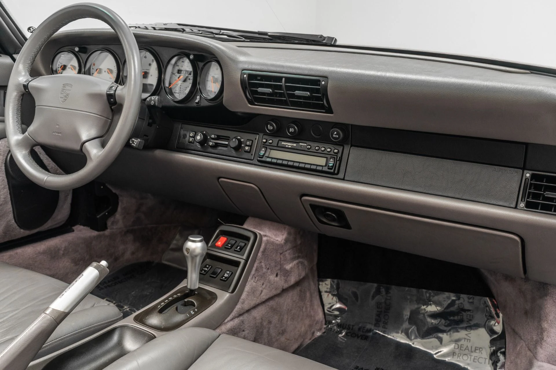 mph013_3894954138_Used_1997_Porsche_911_Carrera_Cabriolet_Tiptronic_Heated_Power_Seats_Supple_Leather_1767644334_89665587bc