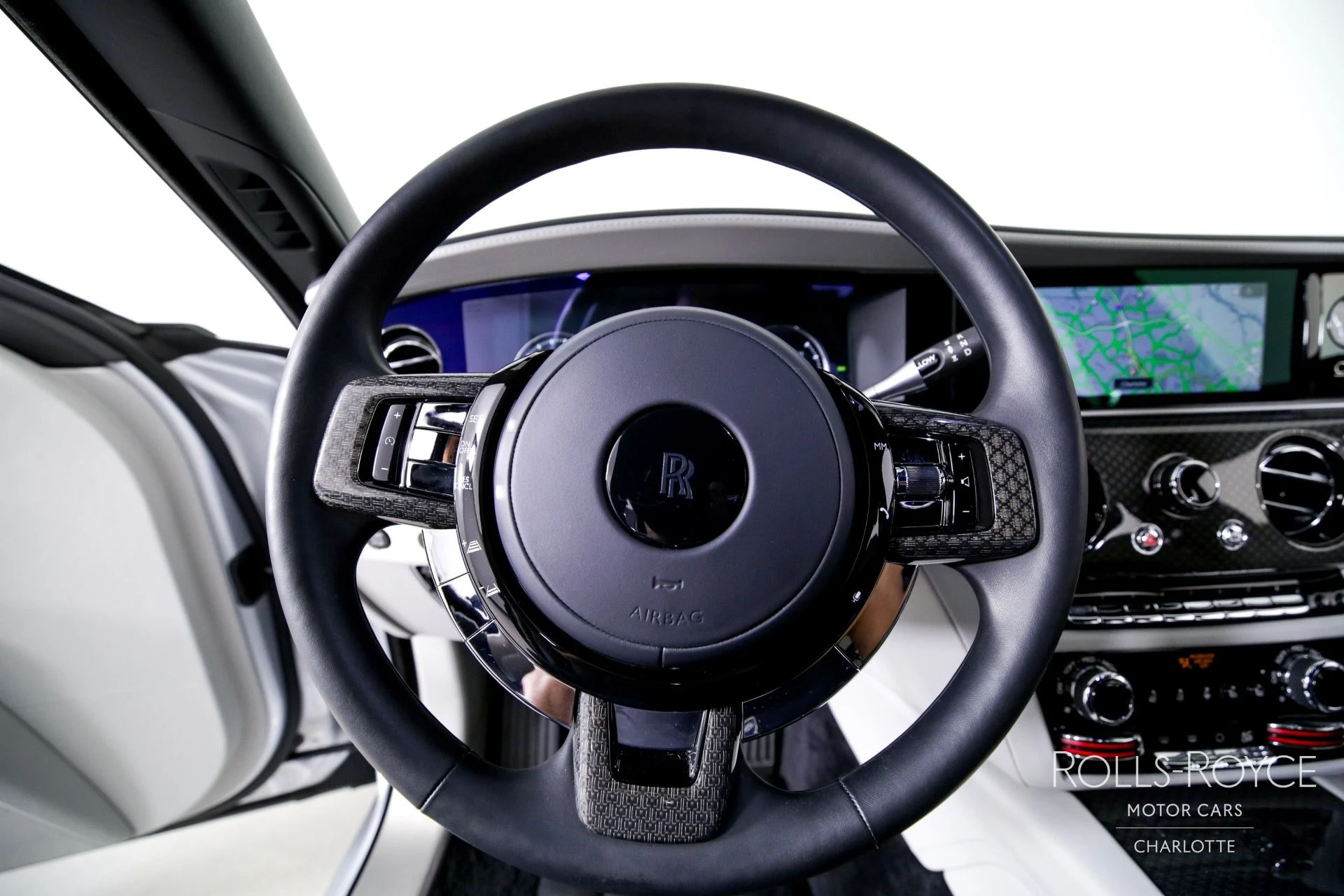 mph014_1824196462_Used_2022_Rolls_Royce_Black_Badge_Ghost_1713469373_3fd649e6aa