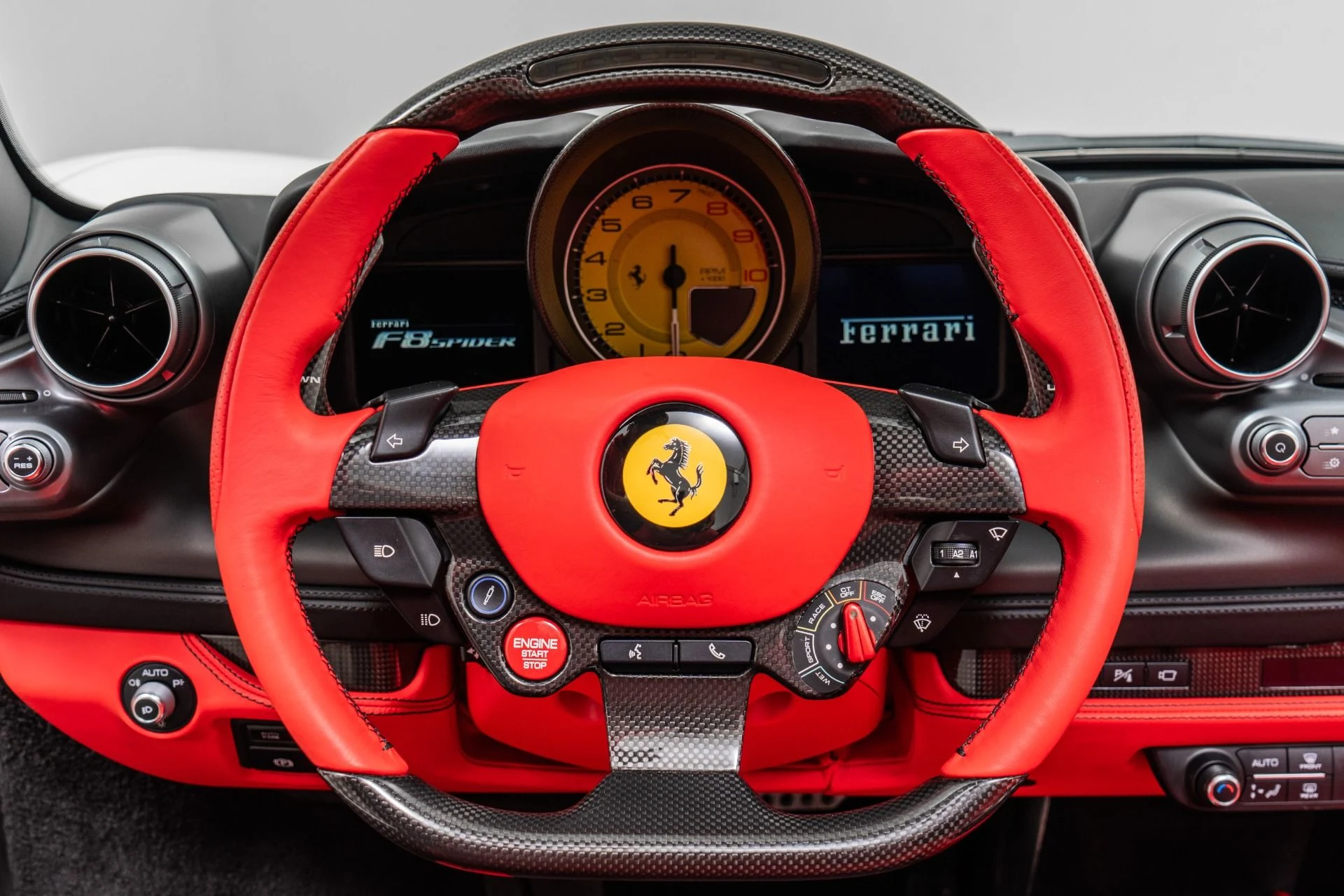 mph014_265320789_Used_2023_Ferrari_F8_Spider_Low_Miles_Two_Tone_Paint_Carbon_Driving_Zone_Passenger_Display_1789405204_879a0cd875