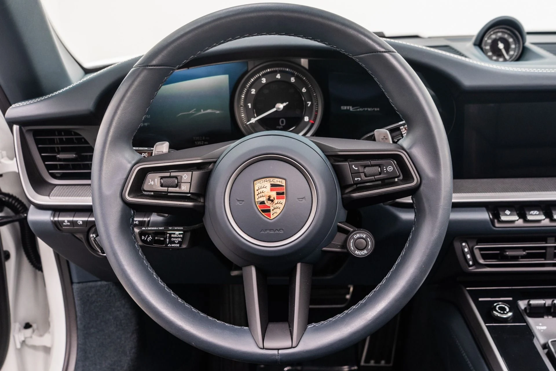 mph014_360024919_Used_2023_Porsche_911_Carrera_Cabriolet_1756923318_c0ed916ff6