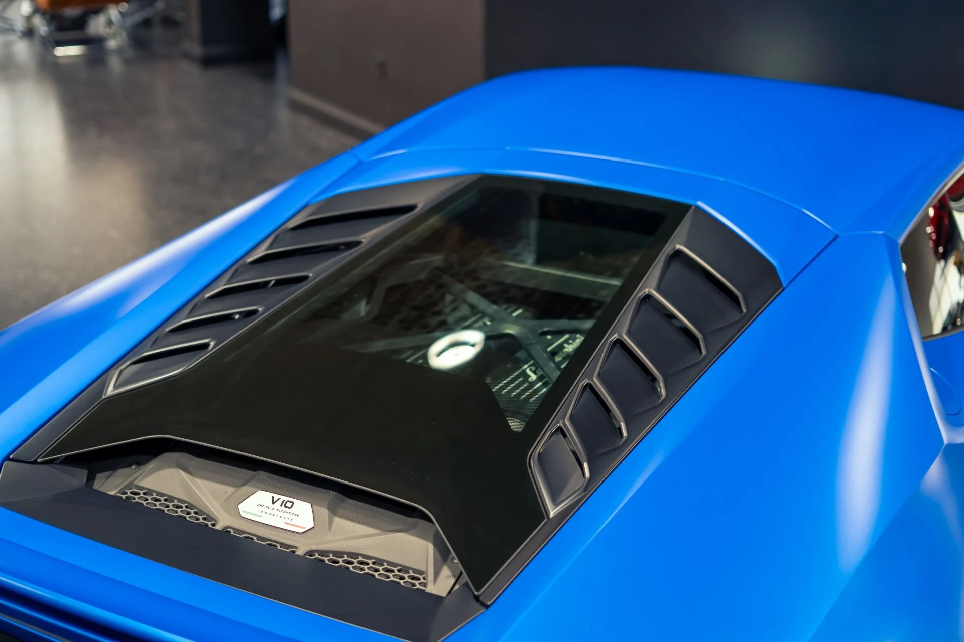 mph014_3919396132_Used_2020_Lamborghini_Huracan_EVO_Blu_Aegeus_Matte_Paint_w_Orange_Leather_Sensonum_Audio_1781118932_f11abab7f1