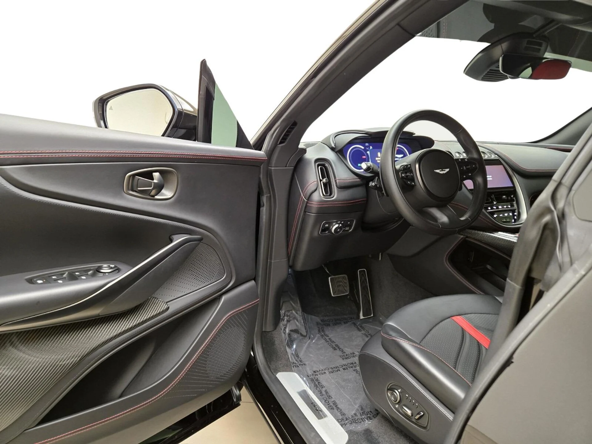 mph015_2607001968_Used_2023_Aston_Martin_DBX_707_1777354911_dcbee39159