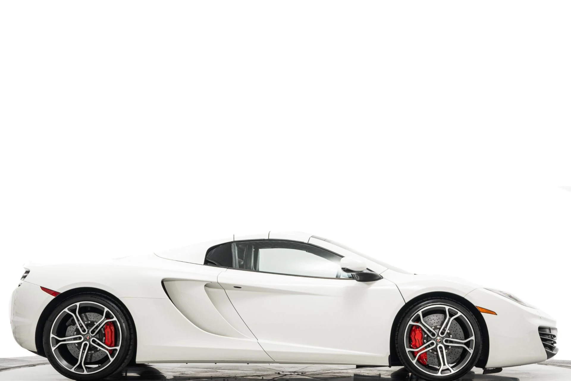 mph017_2447550588_Used_2014_Mc_Laren_MP_4_12_C_Spider_Retractable_Hardtop_616_Horsepower_Low_Miles_1779912312_401a14743b