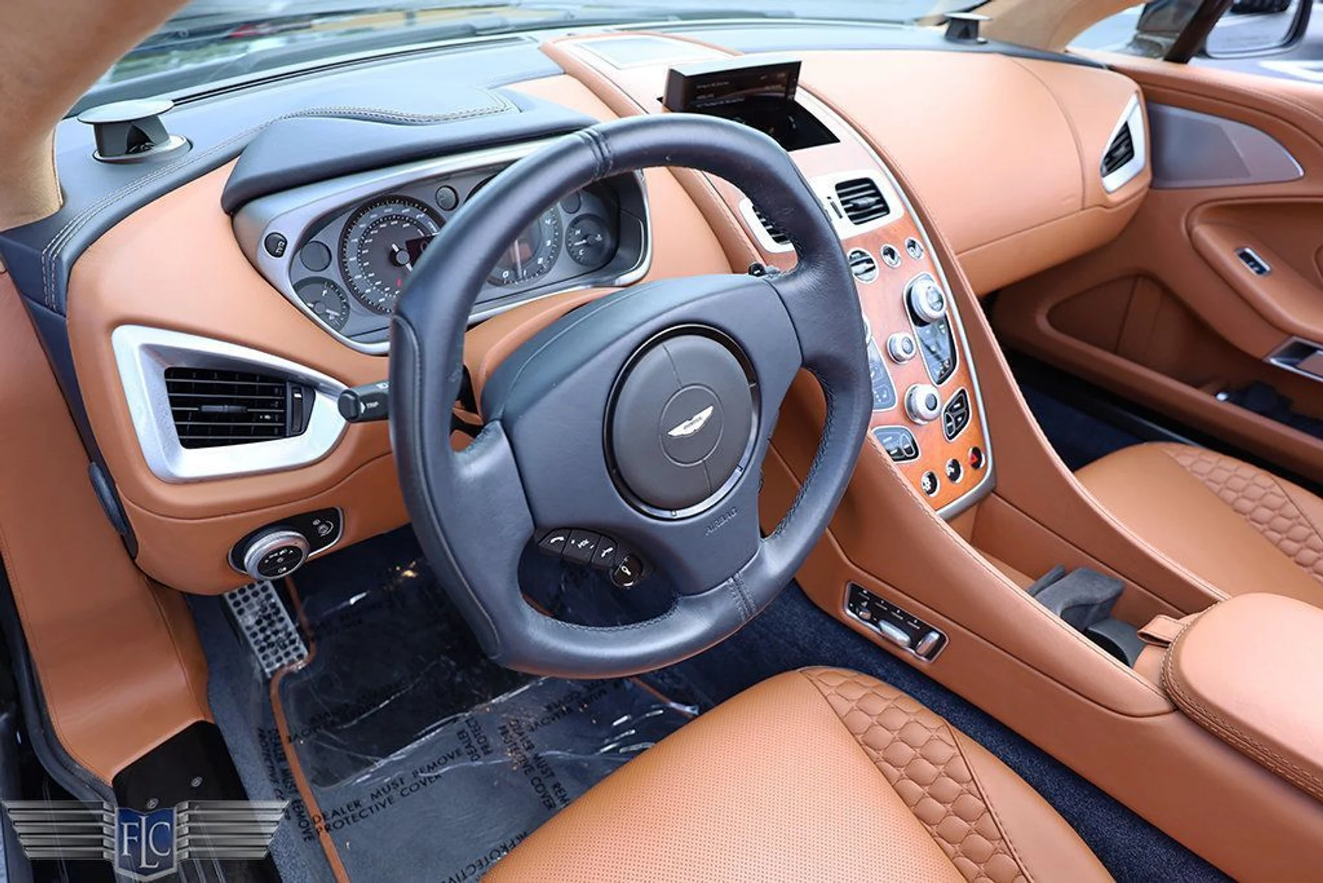 mph017_3450874034_used_2016_aston_martin_vanquish_2drvolante_6305_23035599_18_1024_9e52105c80