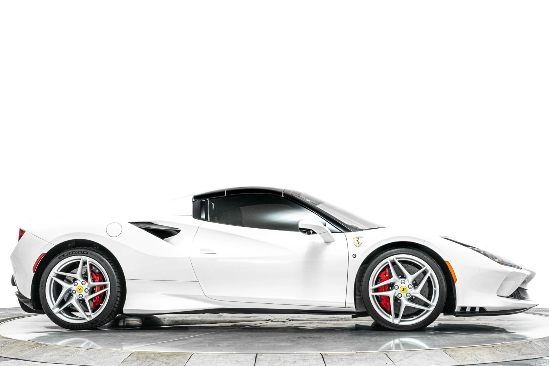 mph017_431008049_Used_2023_Ferrari_F8_Spider_Low_Miles_Two_Tone_Paint_Carbon_Driving_Zone_Passenger_Display_1789405204_43db3335fd