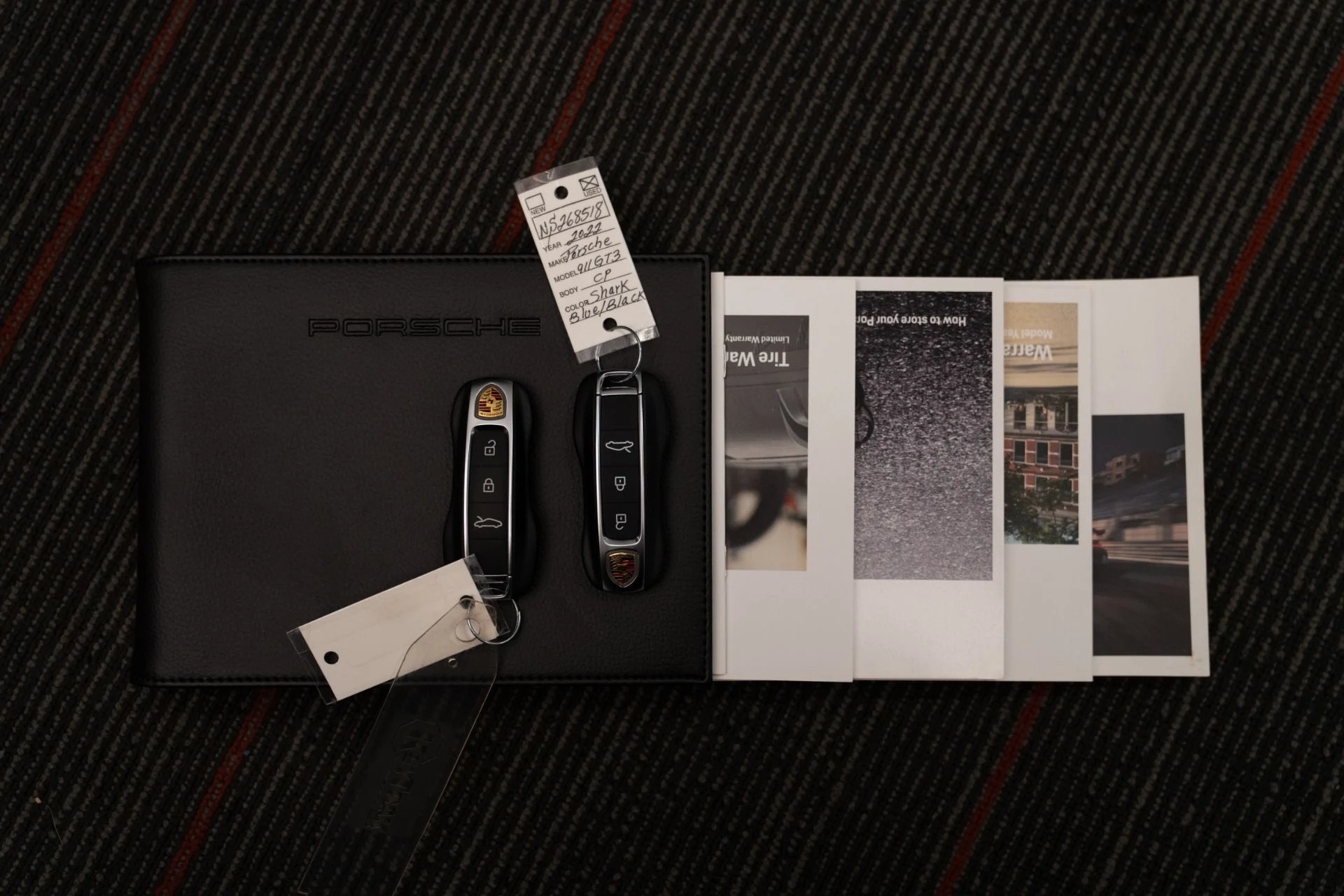 mph018_778979679_Used_2022_Porsche_911_GT_3_6_Speed_Manual_Low_Miles_Carbon_Roof_Blue_Stitching_1762802258_65bc825d97