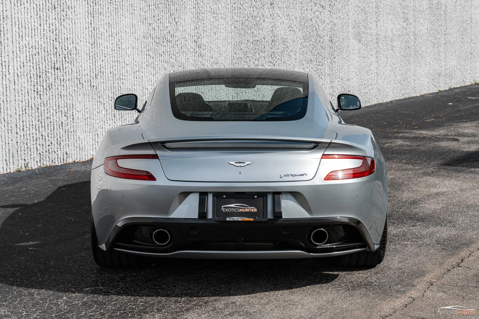 mph019_2397706919_Used_2014_Aston_Martin_Vanquish_Iconic_Skyfall_Silver_w_One77_Steering_Wheel_Carbon_Roof_1692741708_8205a311cb
