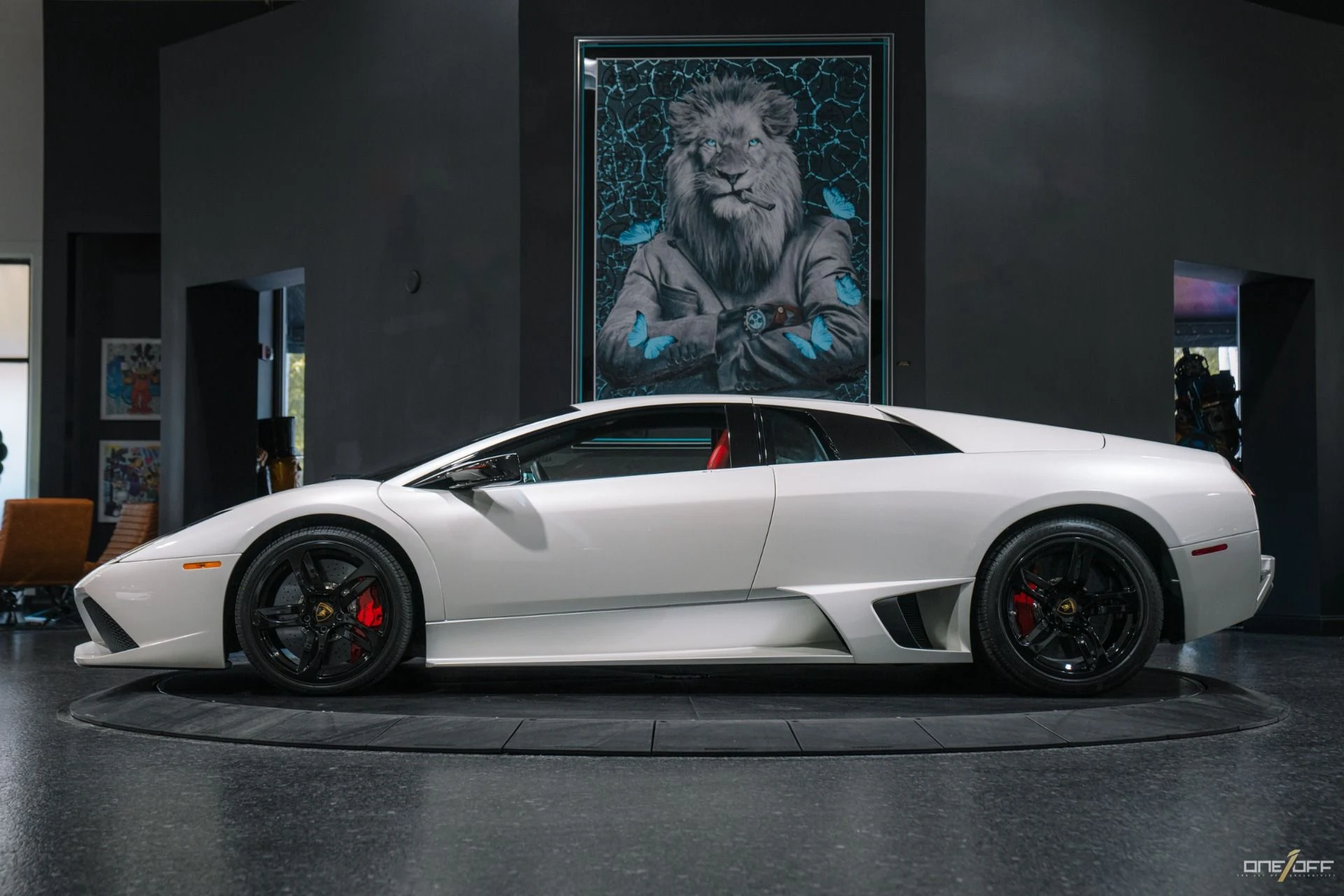 mph020_2079980326_Used_2009_Lamborghini_Murcielago_LP_640_in_Balloon_White_over_Red_Interior_w_Front_Lift_1754600274_a154c84aa9