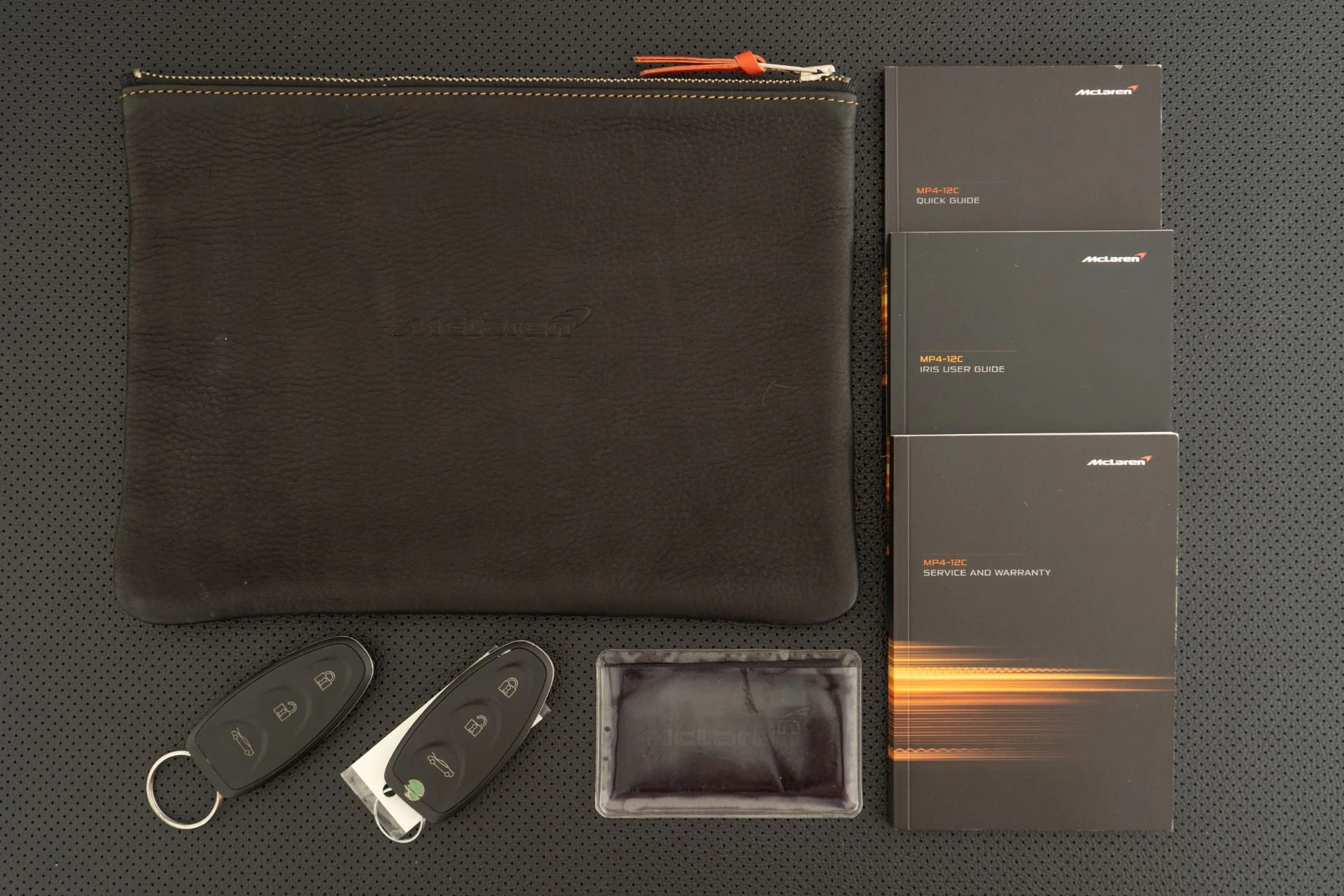 mph020_338839714_Used_2013_Mc_Laren_MP_4_12_C_Spider_Low_Miles_Super_Lightweight_Wheels_Stealth_Pack_1758231288_f706025b79