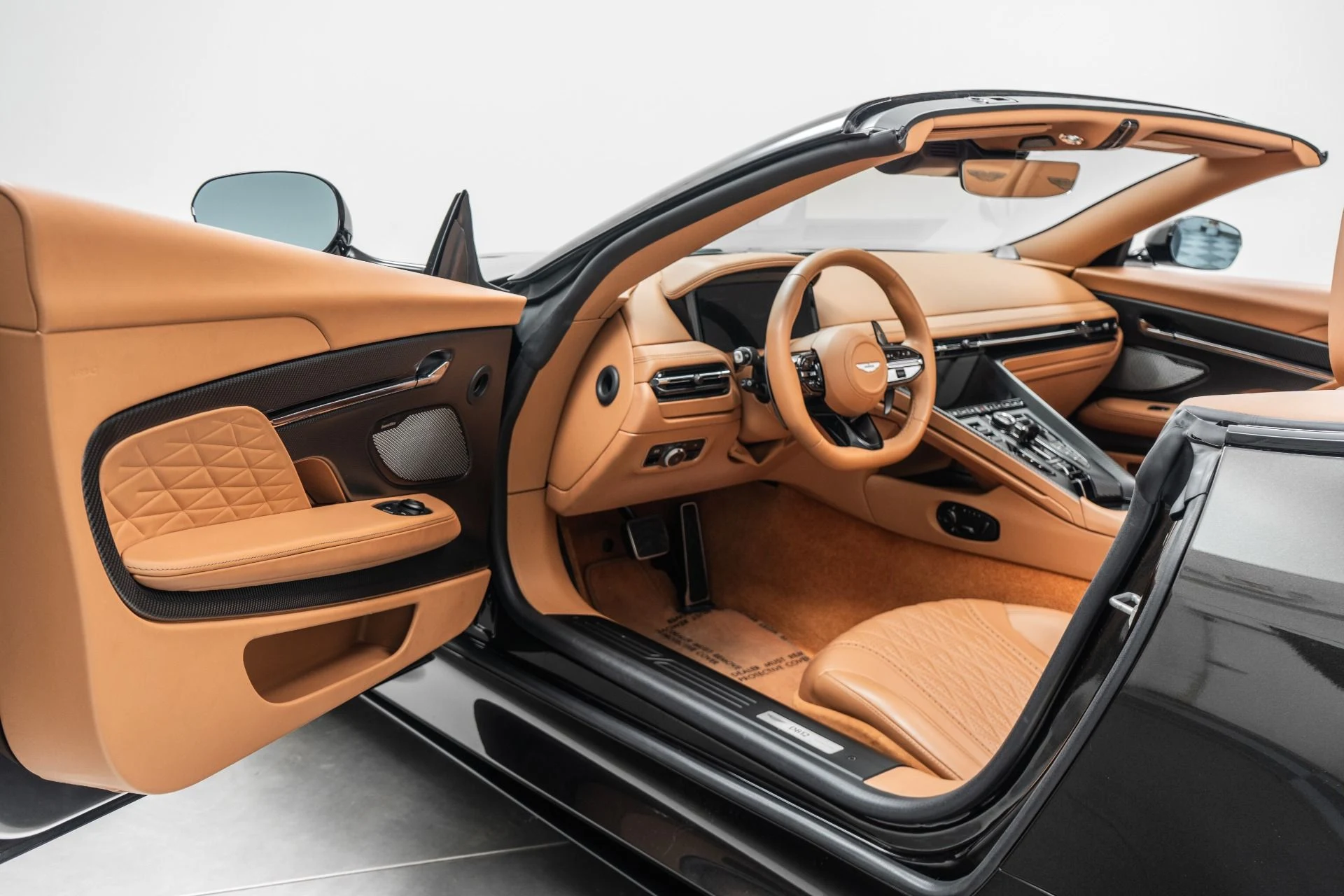 mph021_3571988793_Used_2024_Aston_Martin_DB_12_Volante_Low_Miles_86_K_in_Options_Gorgeous_Color_Combination_1774375825_89bdf400ae