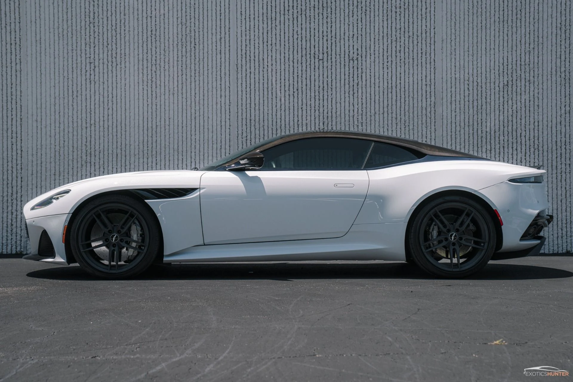 mph022_1957430811_Used_2019_Aston_Martin_DBS_Superleggera_in_White_Stone_w_Carbon_Exterior_1755546225_185caa3ed8